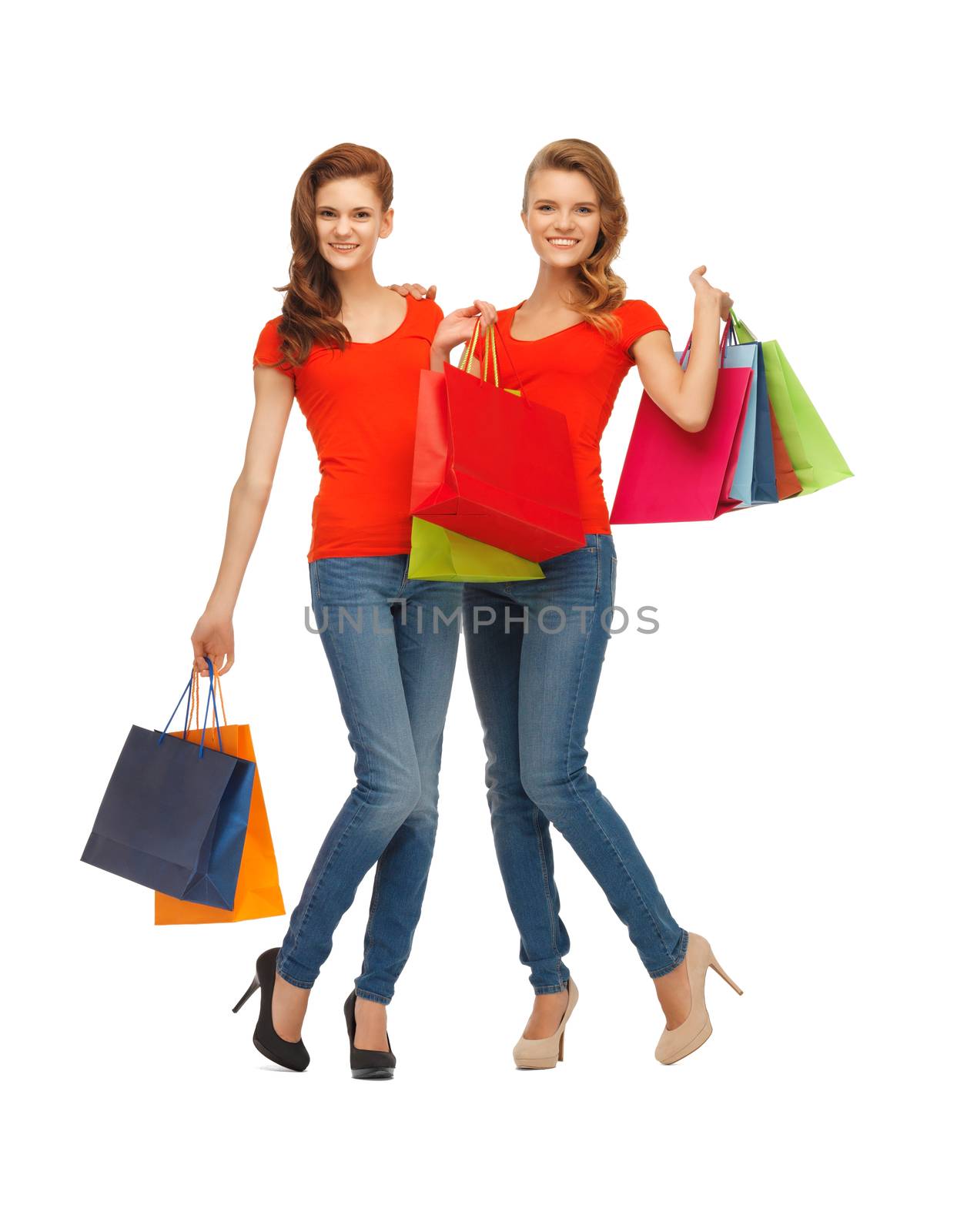 two teenage girls with shopping bags by dolgachov