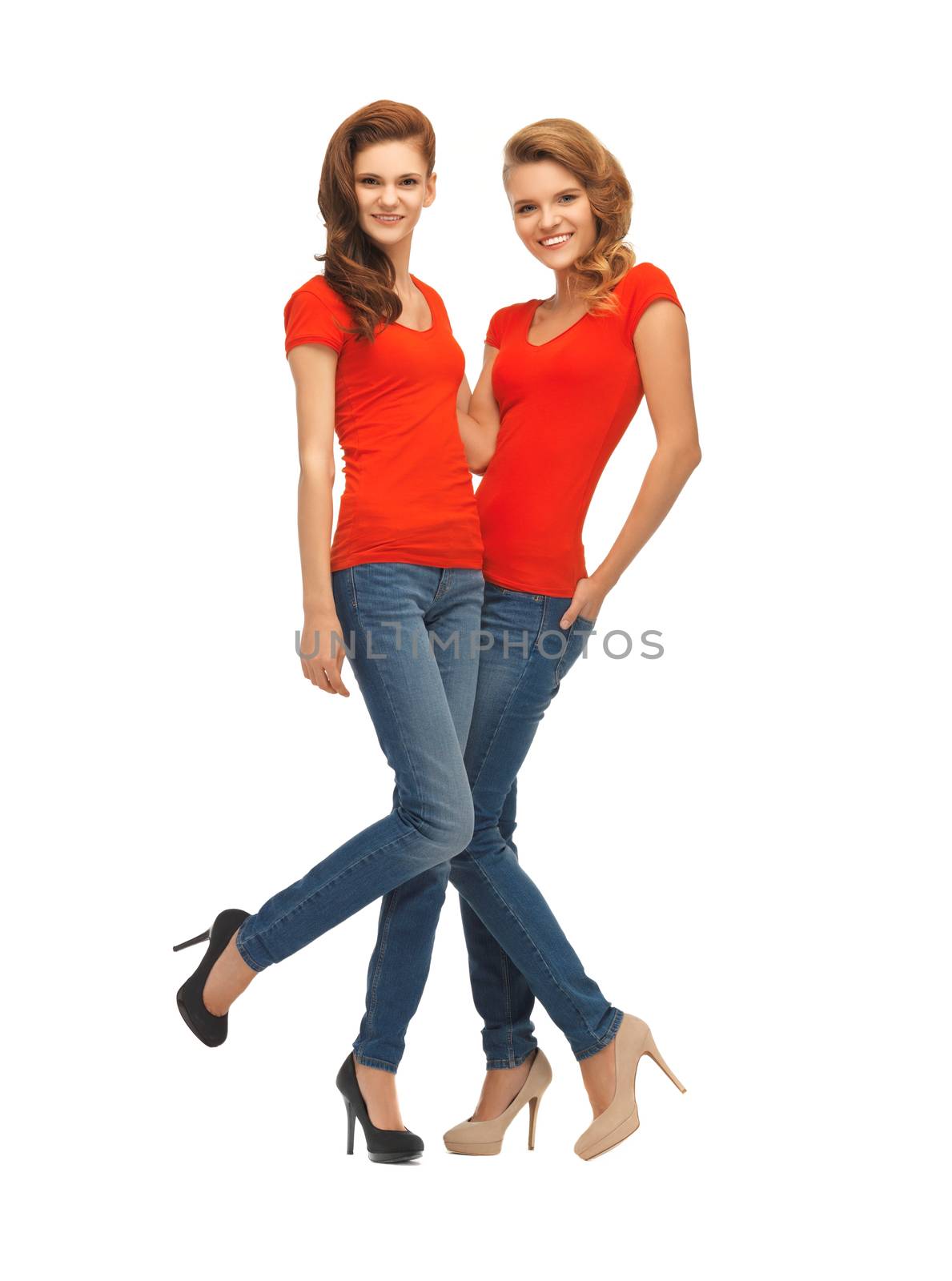 two beautiful teenage girls in red t-shirts by dolgachov