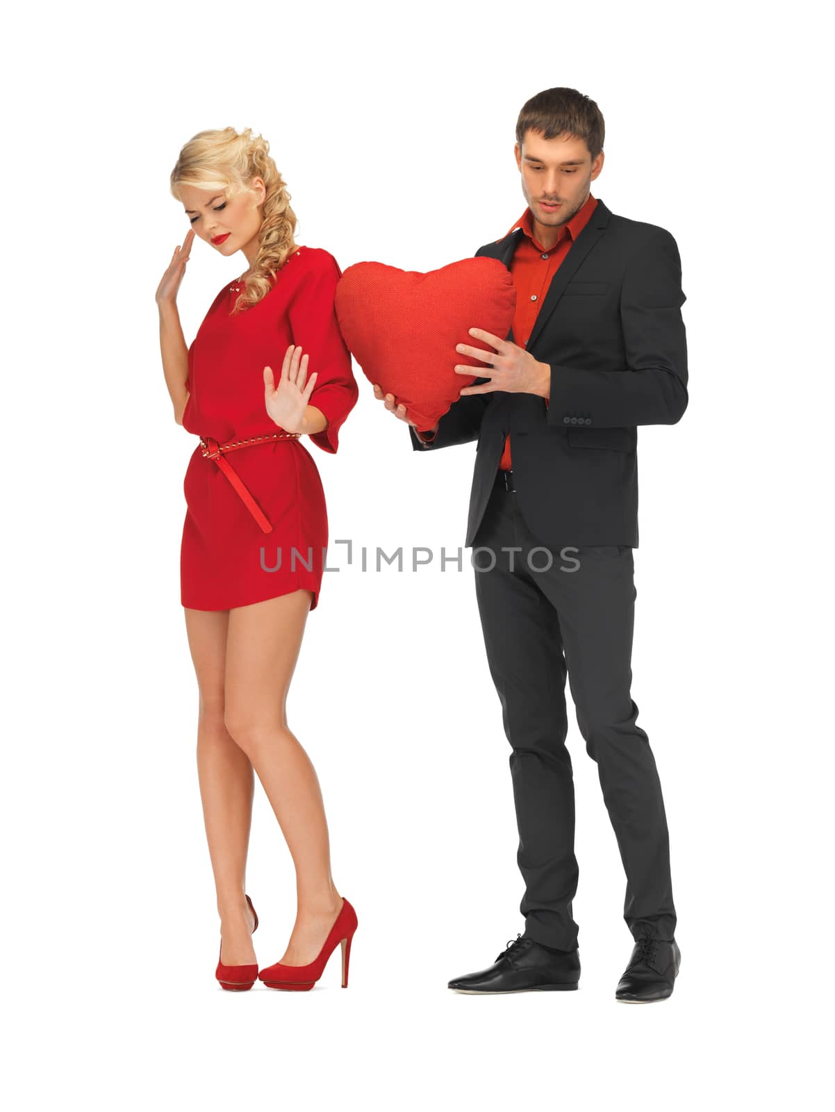 beautiful couple holding big heart by dolgachov