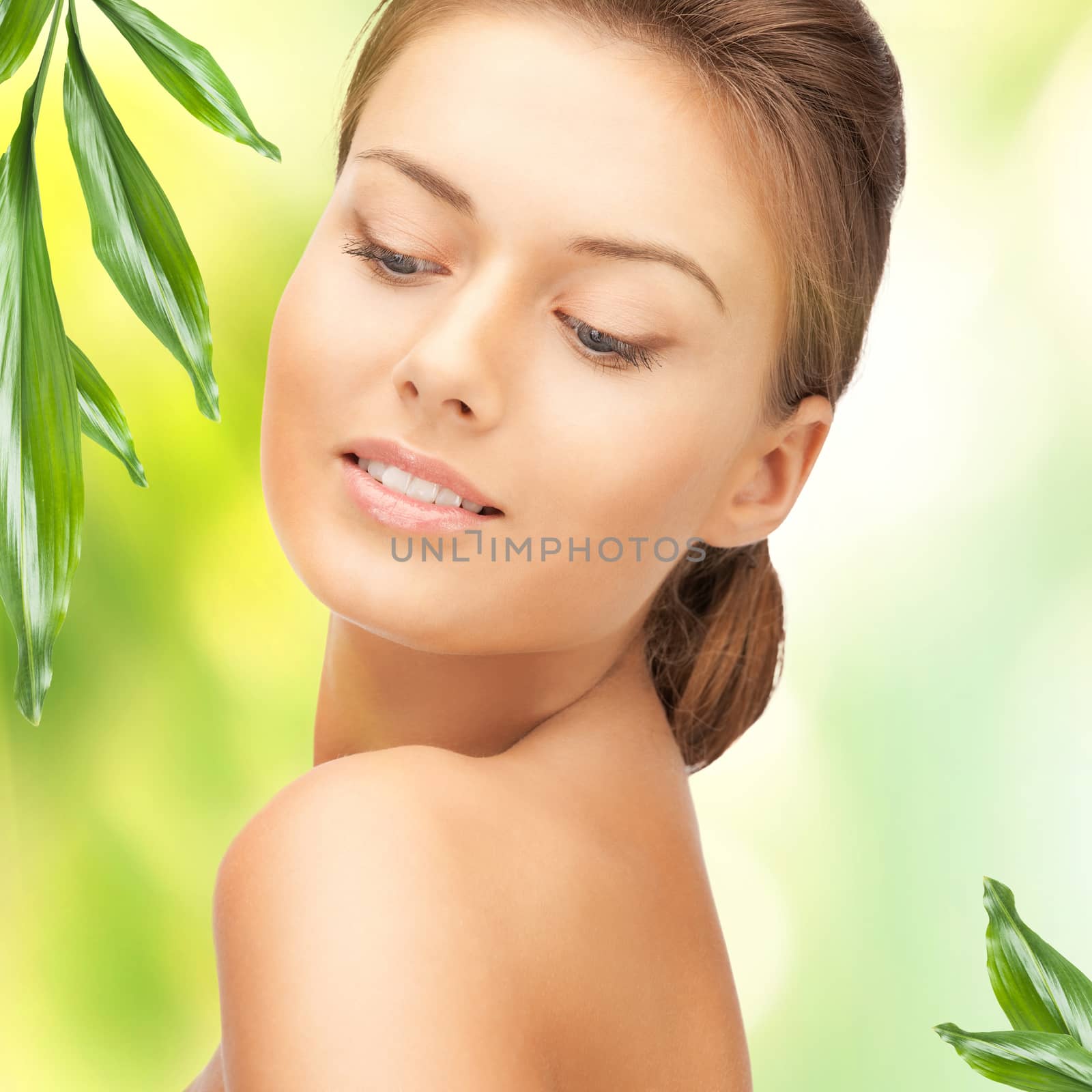 beautiful woman with green leaves by dolgachov