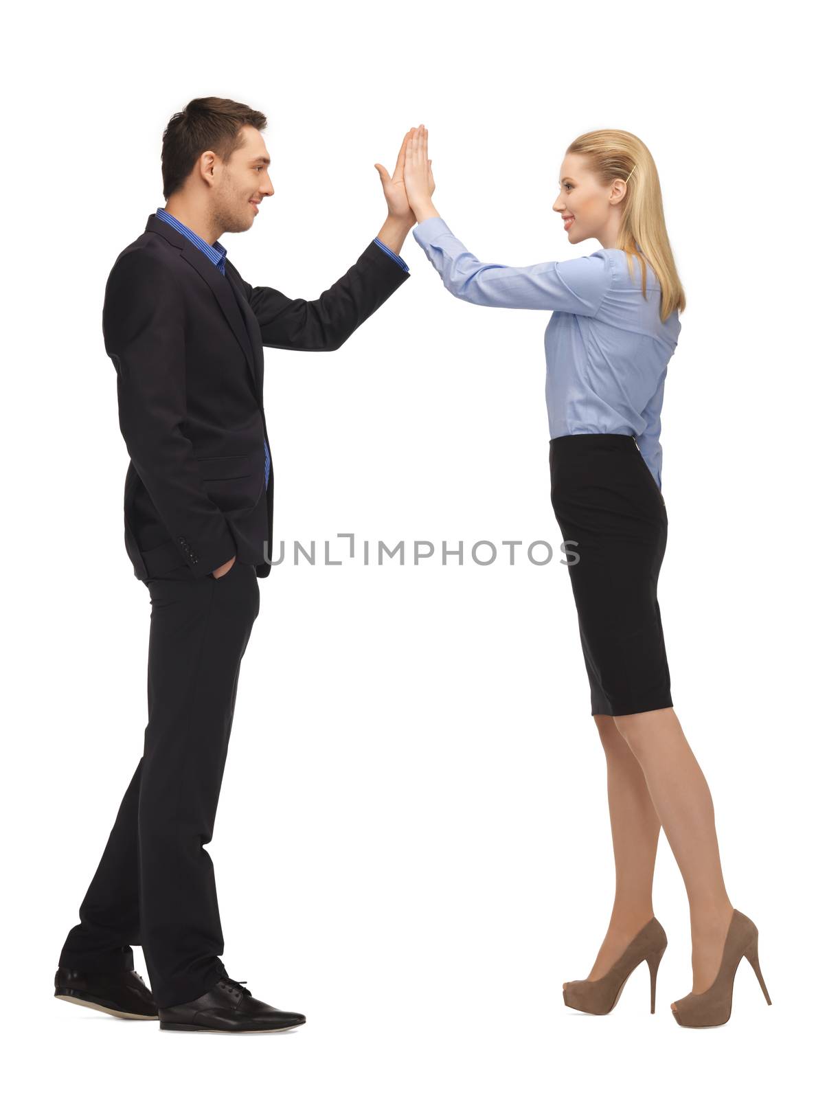 bright picture of man and woman giving a high five.