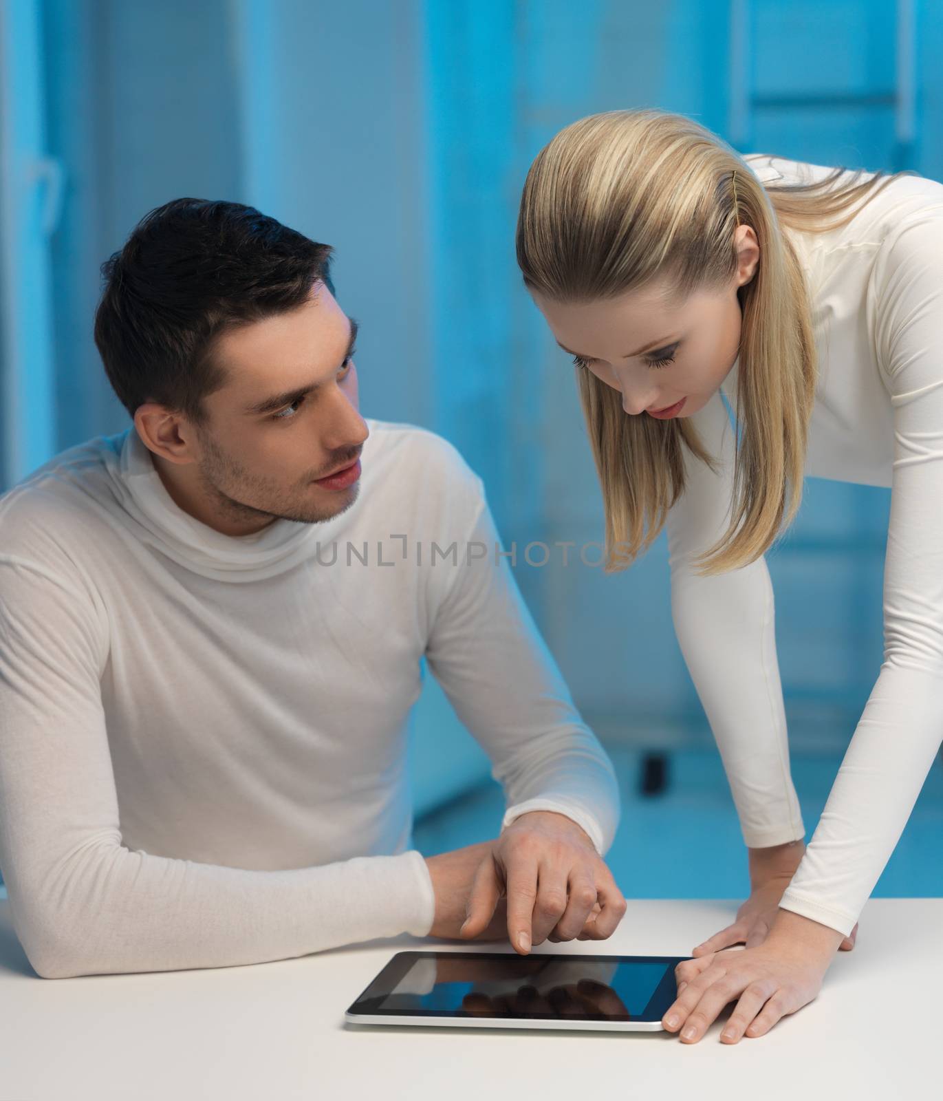 picture of man and woman in space laboratory