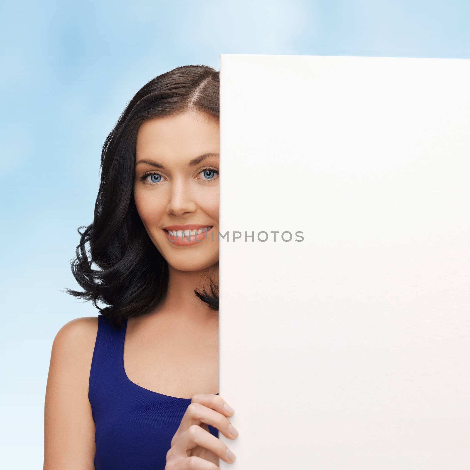 lovely woman in blue dress with blank board by dolgachov