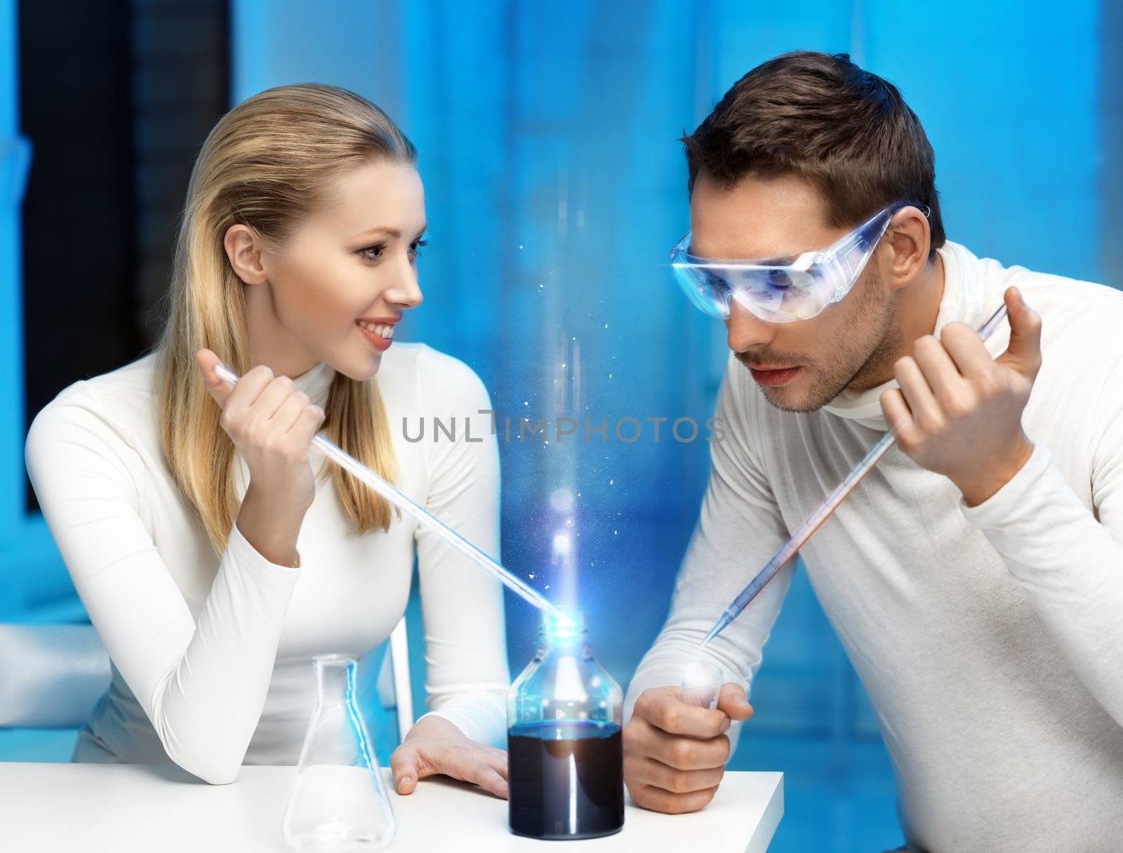 man and woman in laboratory by dolgachov