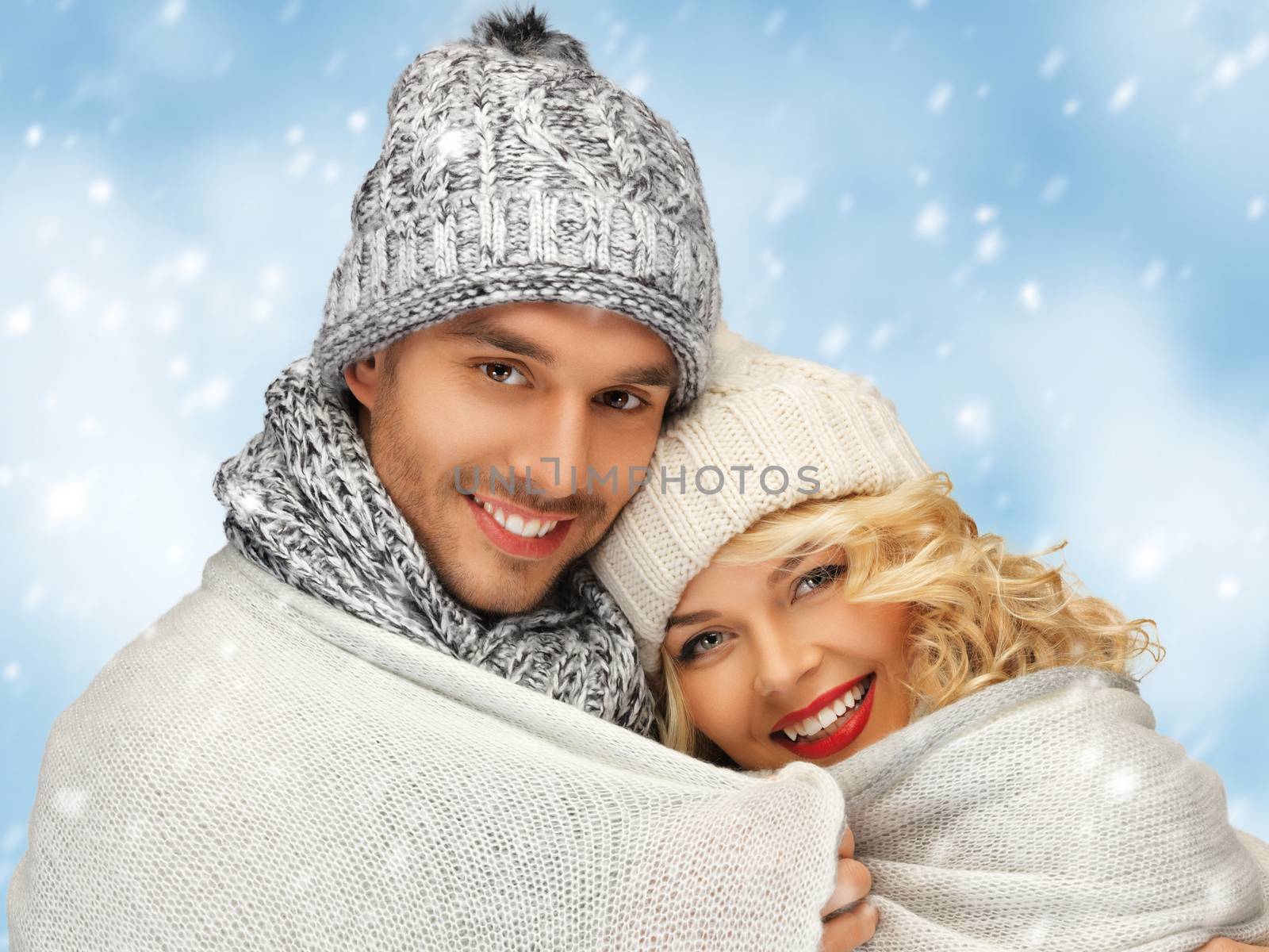 family couple in a winter clothes by dolgachov