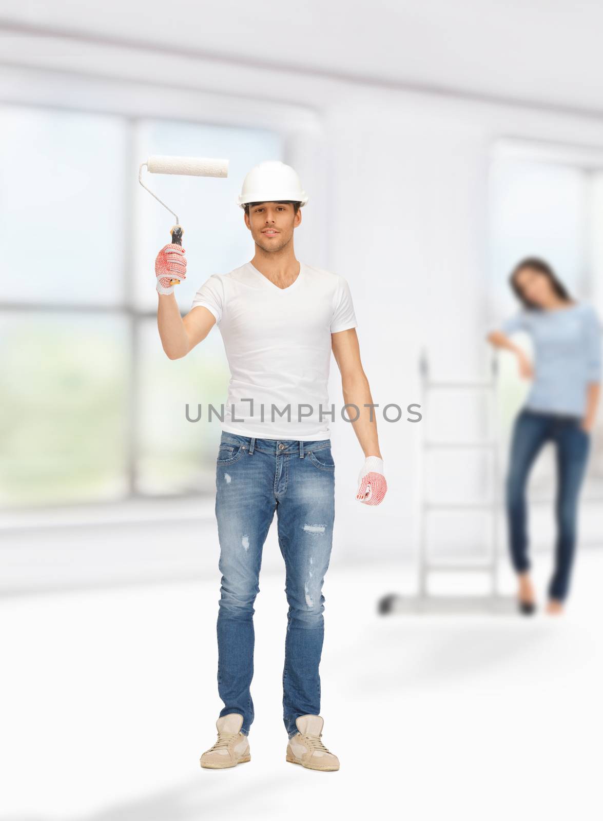 bright picture of young man and woman renovating their home