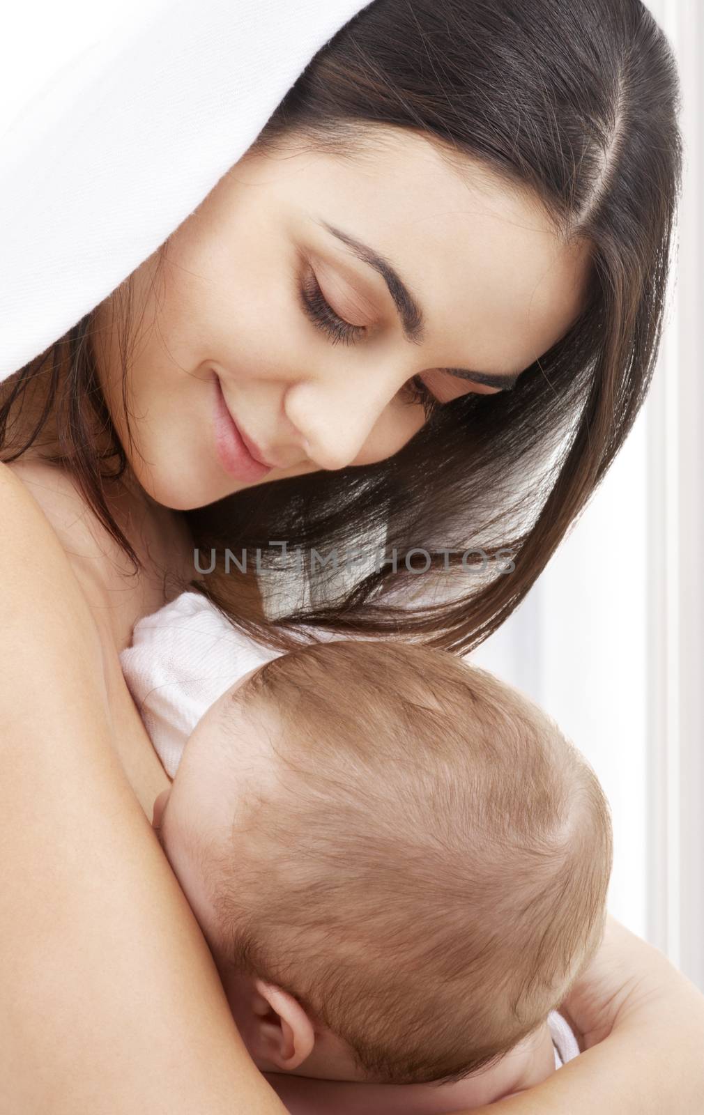 picture of happy mother with baby at home