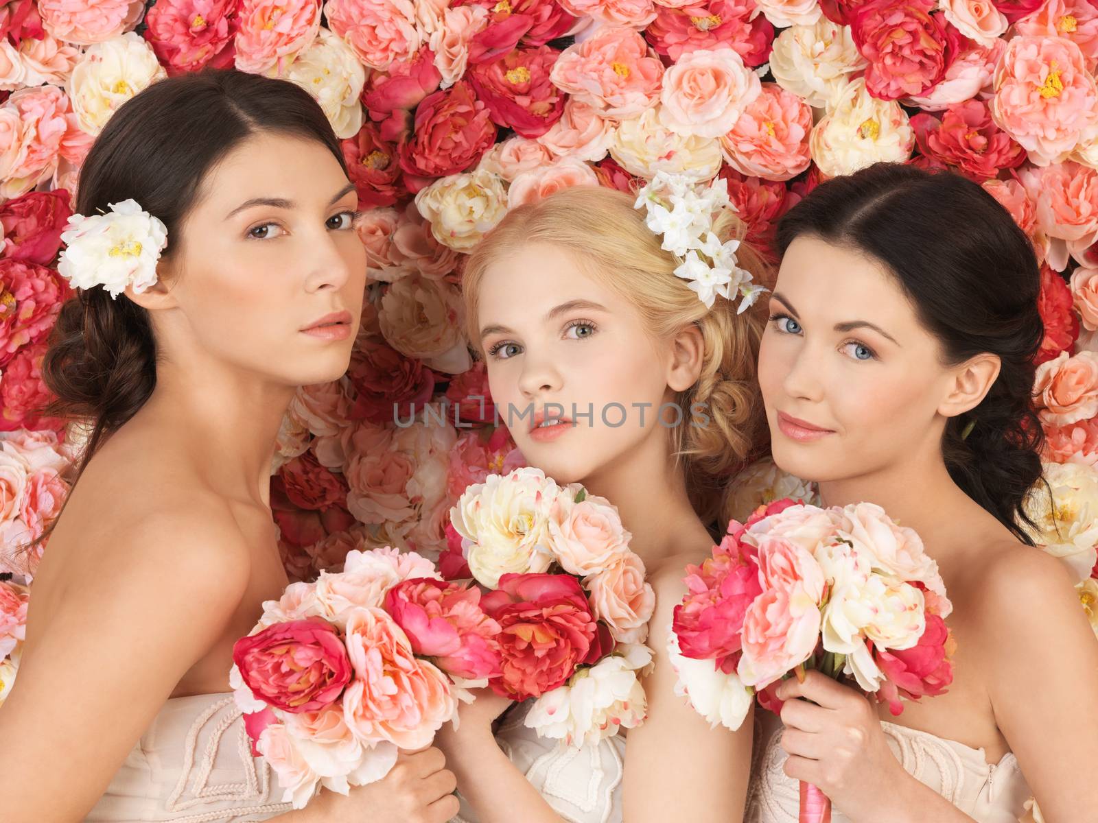 beautiful three women with background full of roses