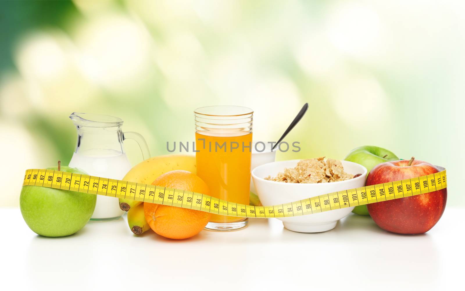 healthy breakfast and measuring tape by dolgachov