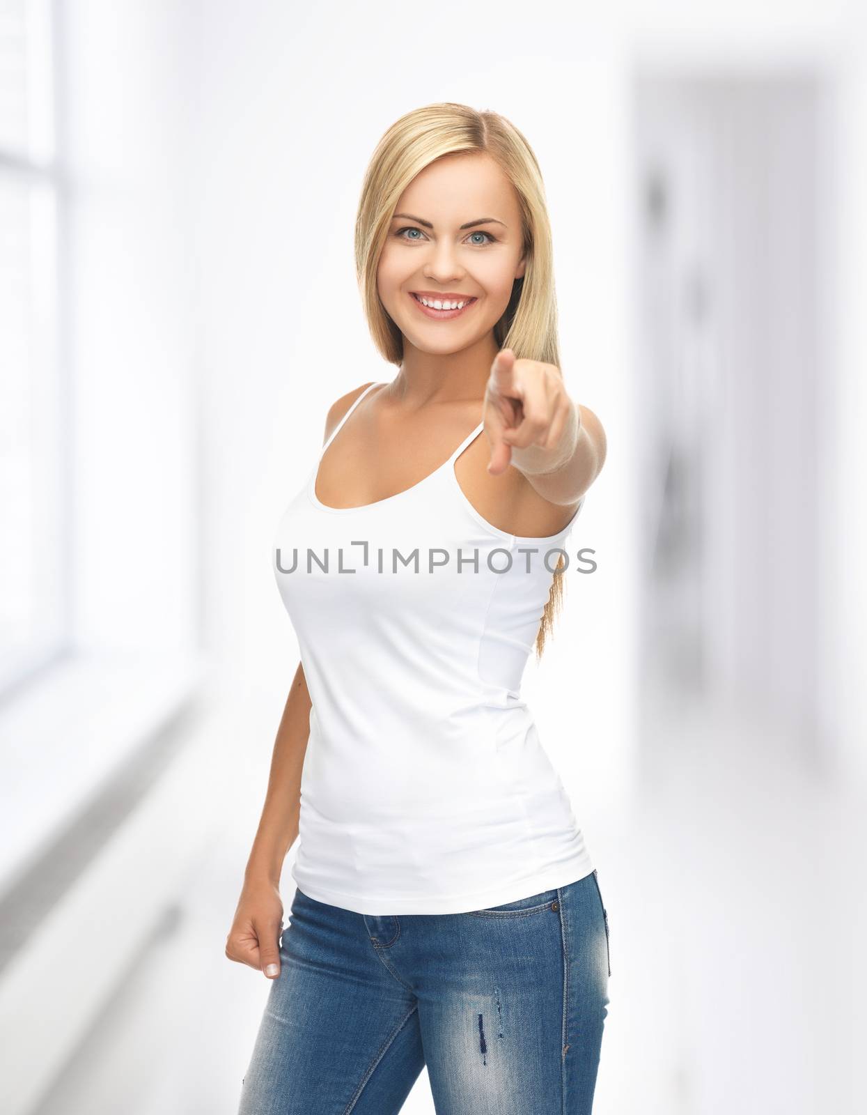 woman in blank white t-shirt pointing at you by dolgachov