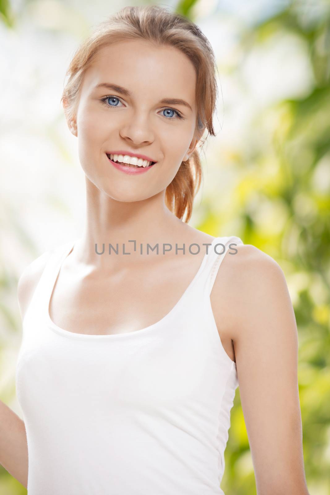 happy and smiling teenage girl by dolgachov