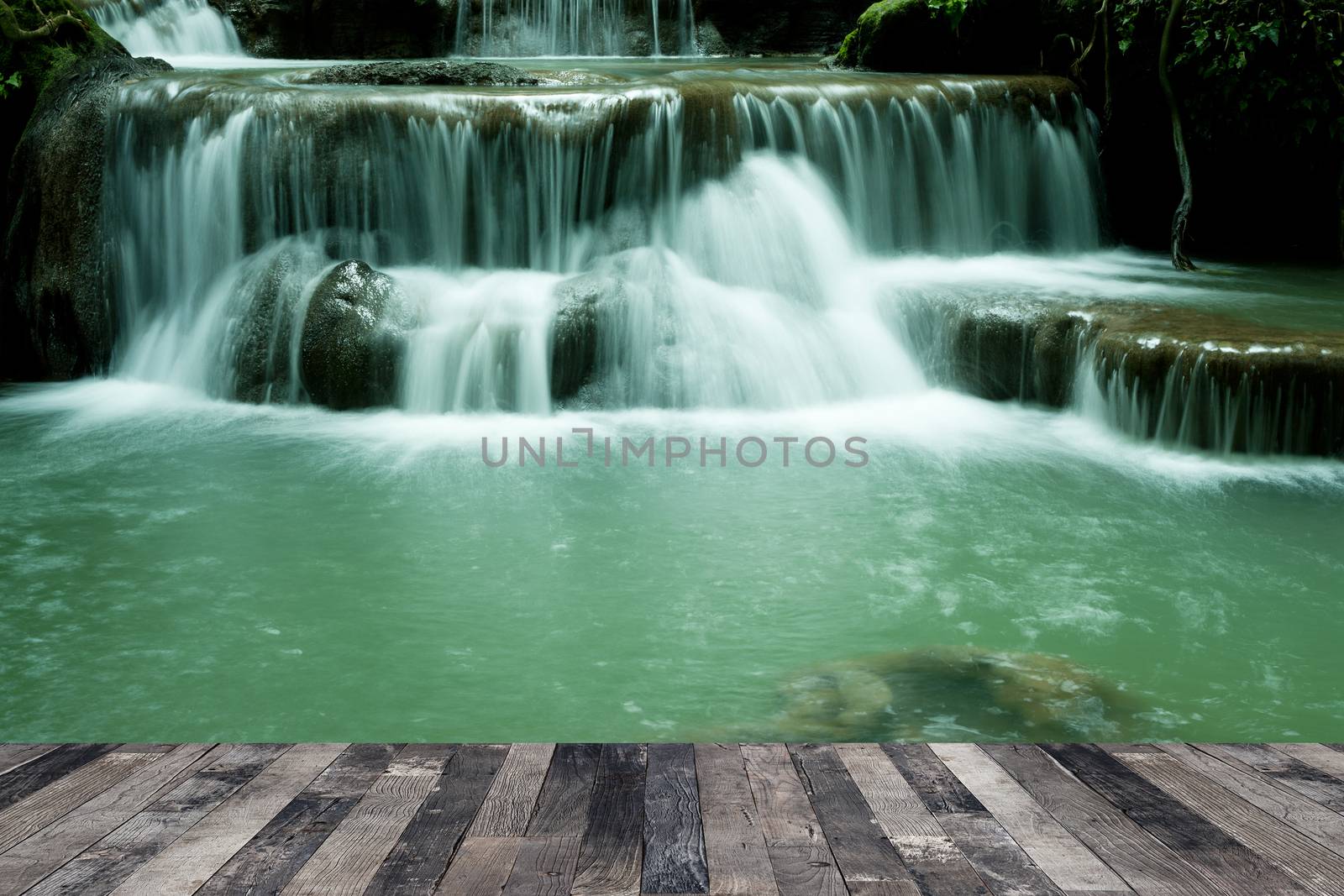 View of the waterfall above a wooden floor