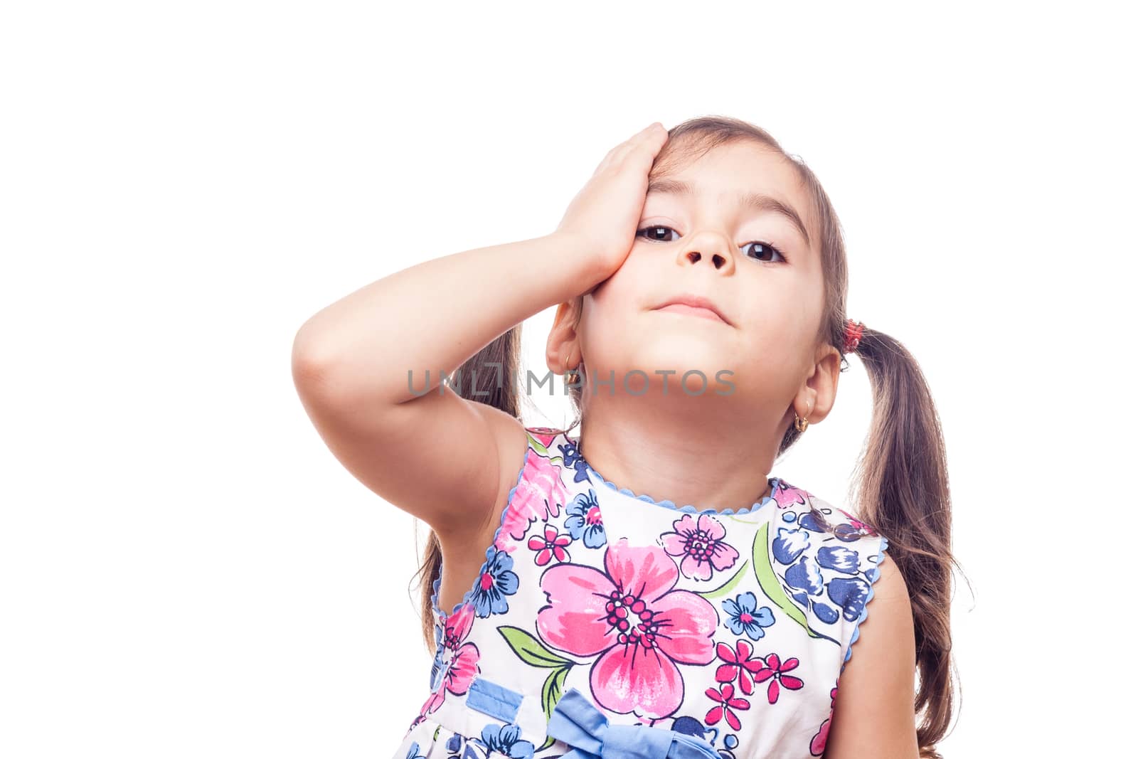 young girl on white background whit hand on face