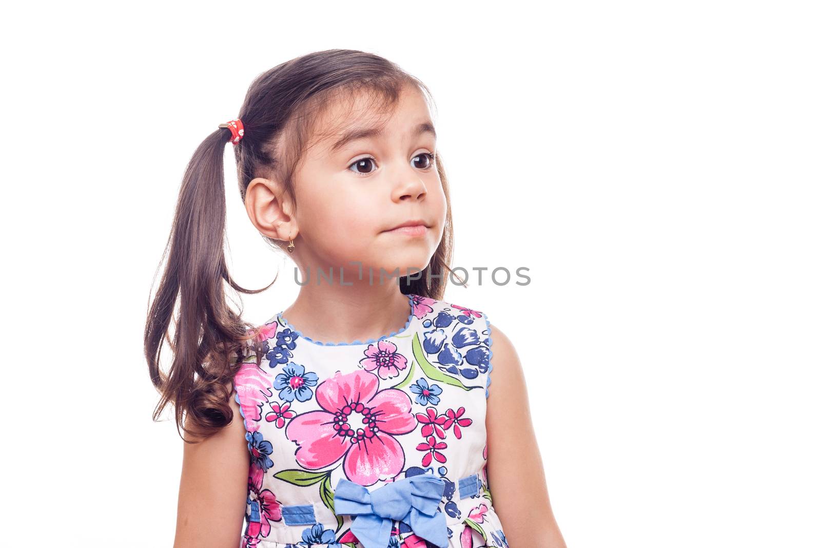 young girl on white background posing for the camera