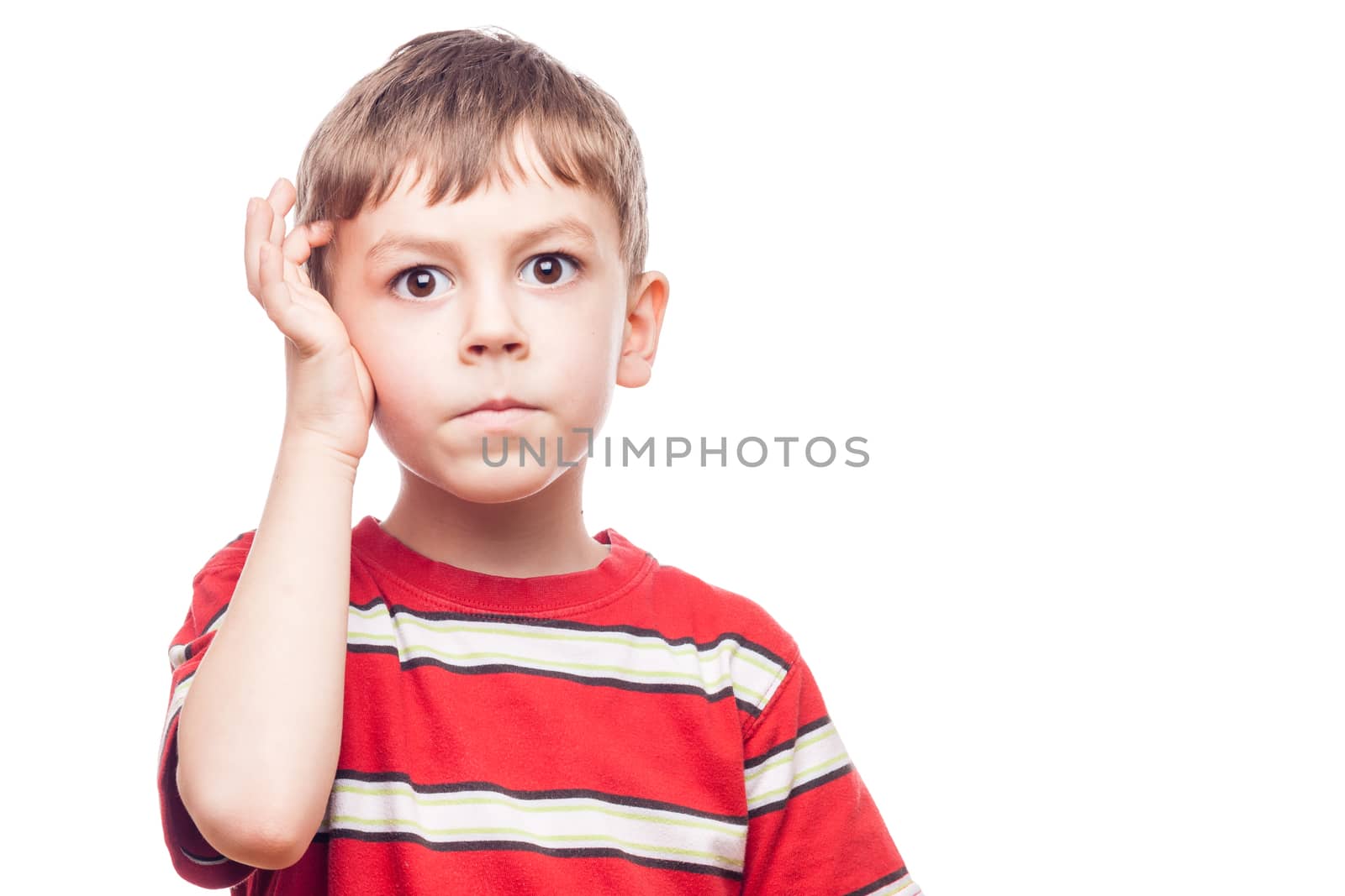 portrait of a young boy thinking  on white background