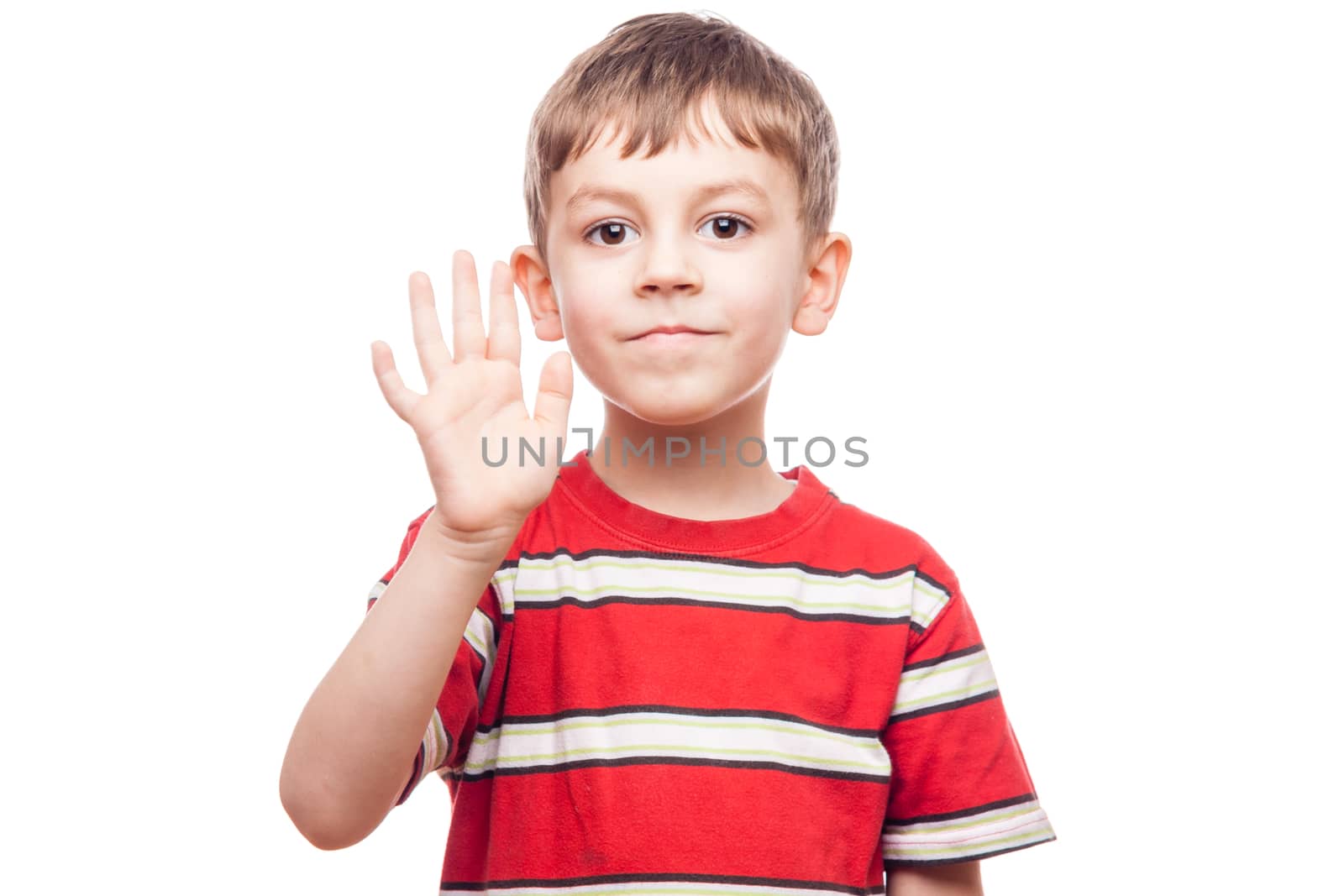 portrait of a young boy waving on white background
