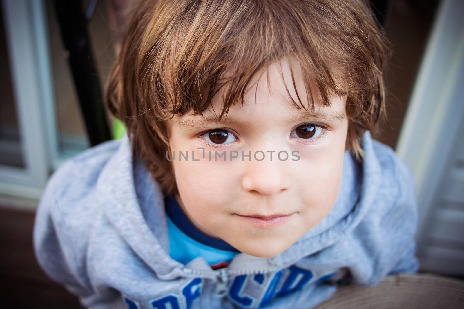 Little boy smiling by Talanis