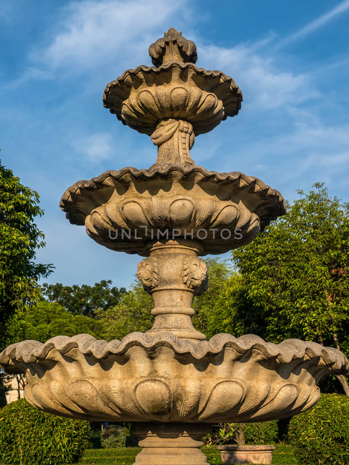 Beautiful vintage courtyard fountain  under the sunlight