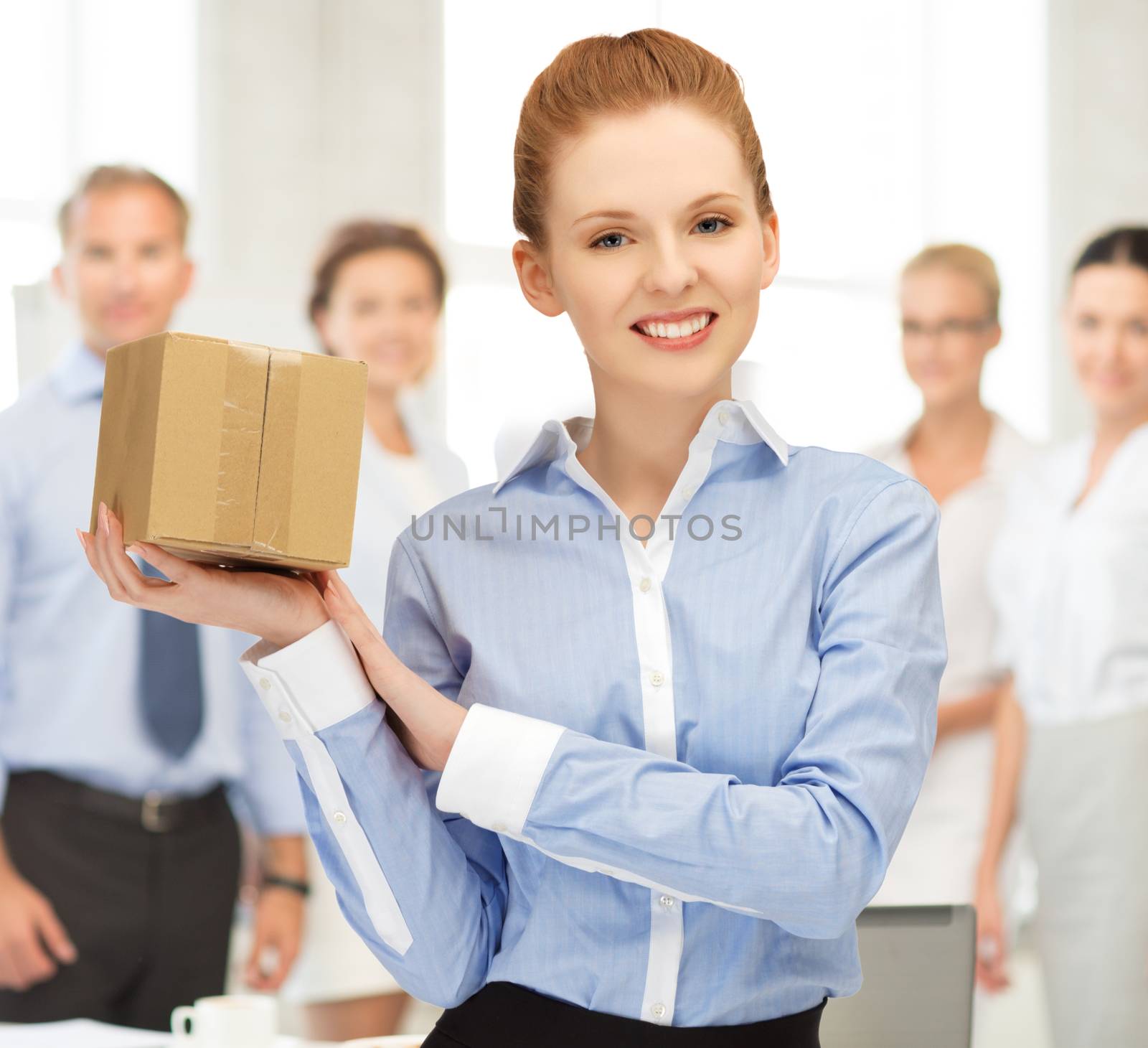 woman with cardboard box by dolgachov