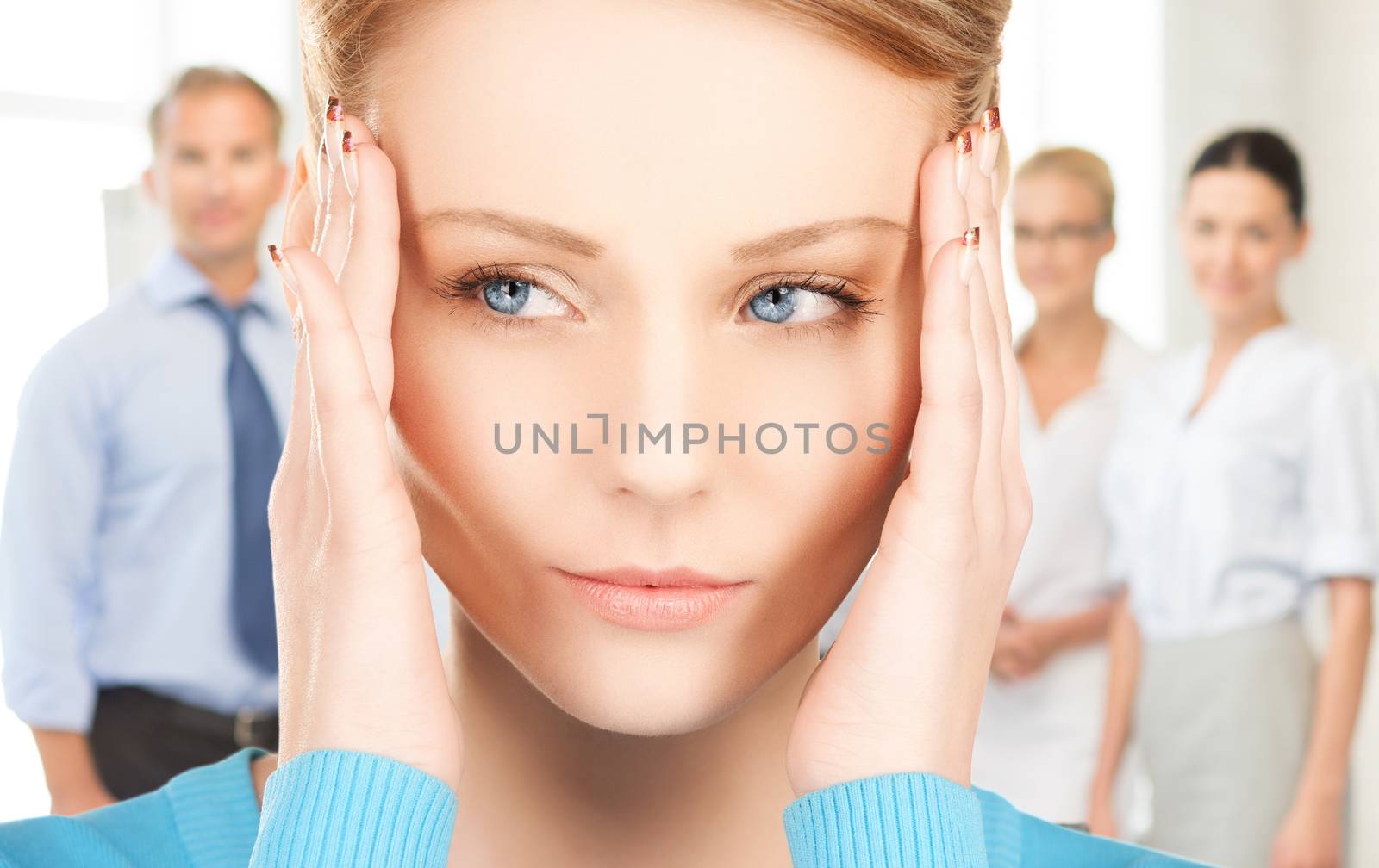 unhappy woman holding her head with hands