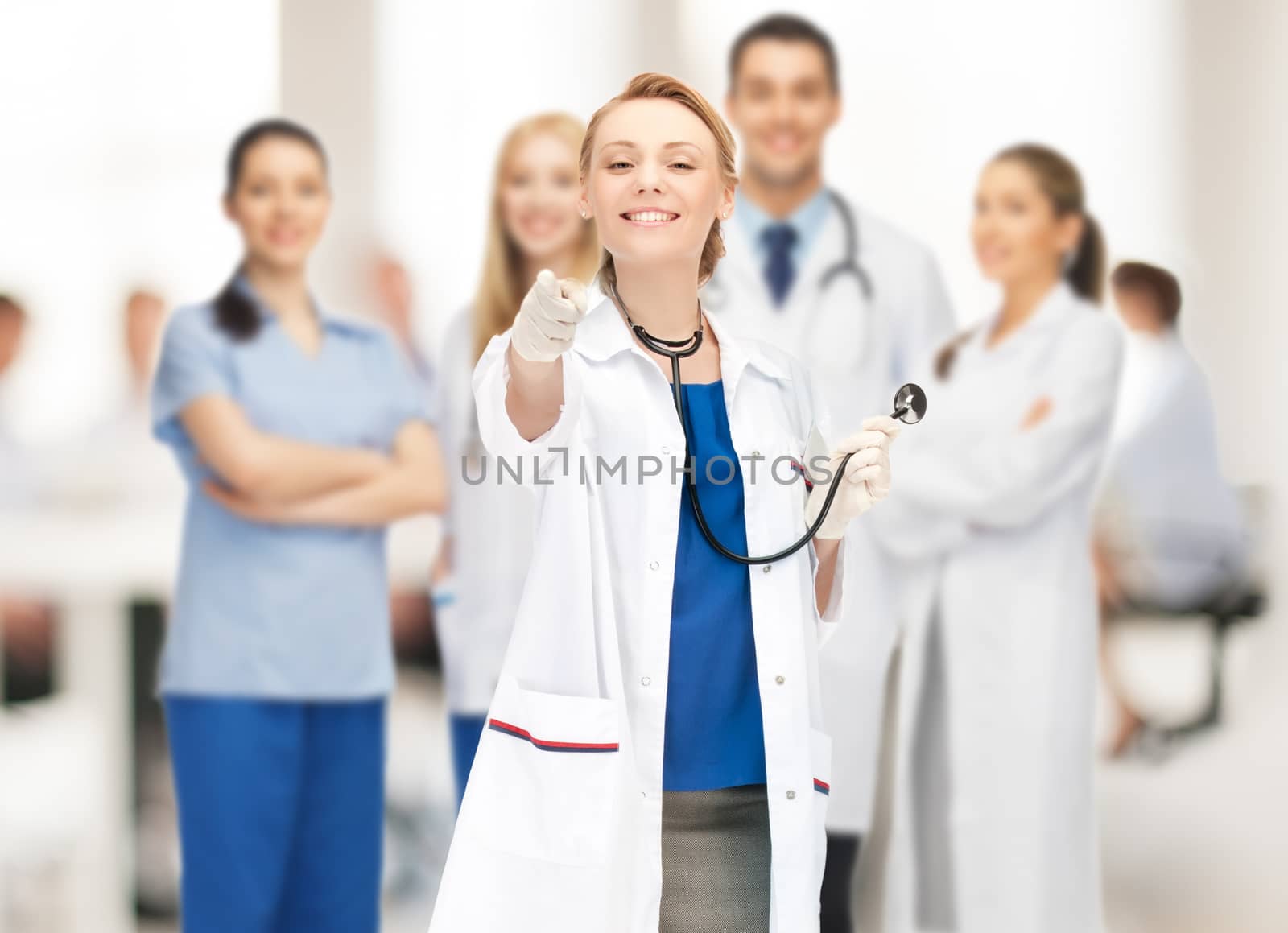 picture of attractive female doctor pointing her finger