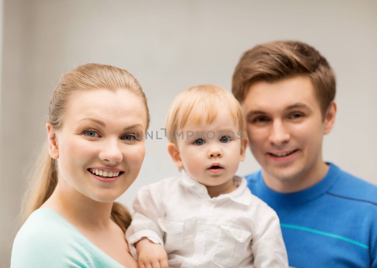 happy family with adorable baby by dolgachov