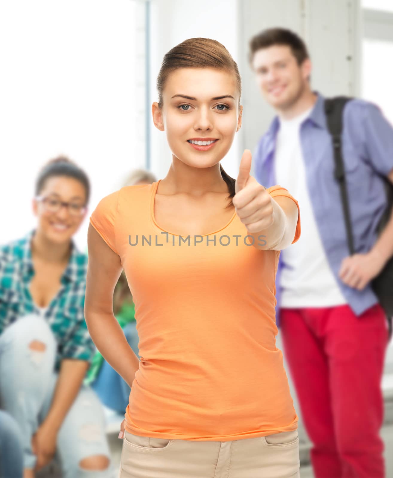 woman showing thumbs up at school by dolgachov