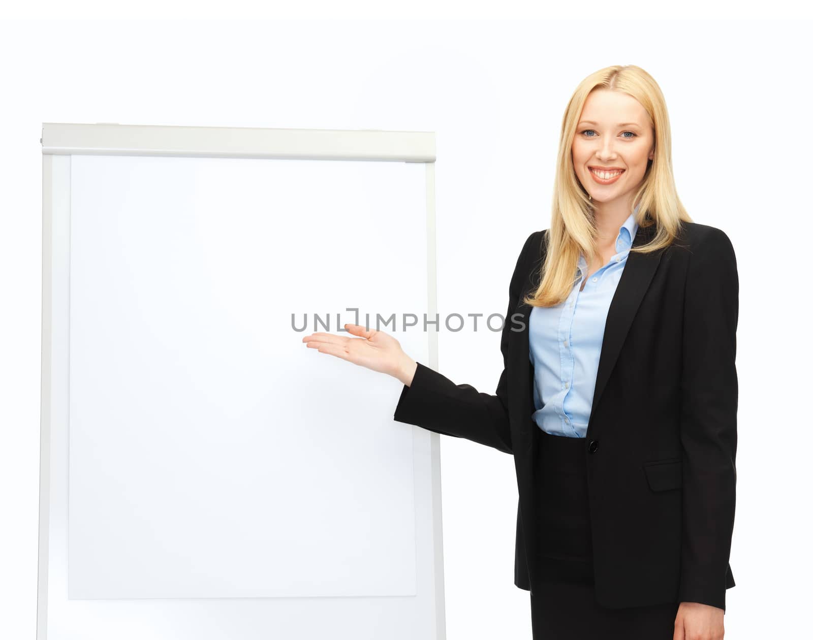 bussiness and education - businesswoman with flipchart in office
