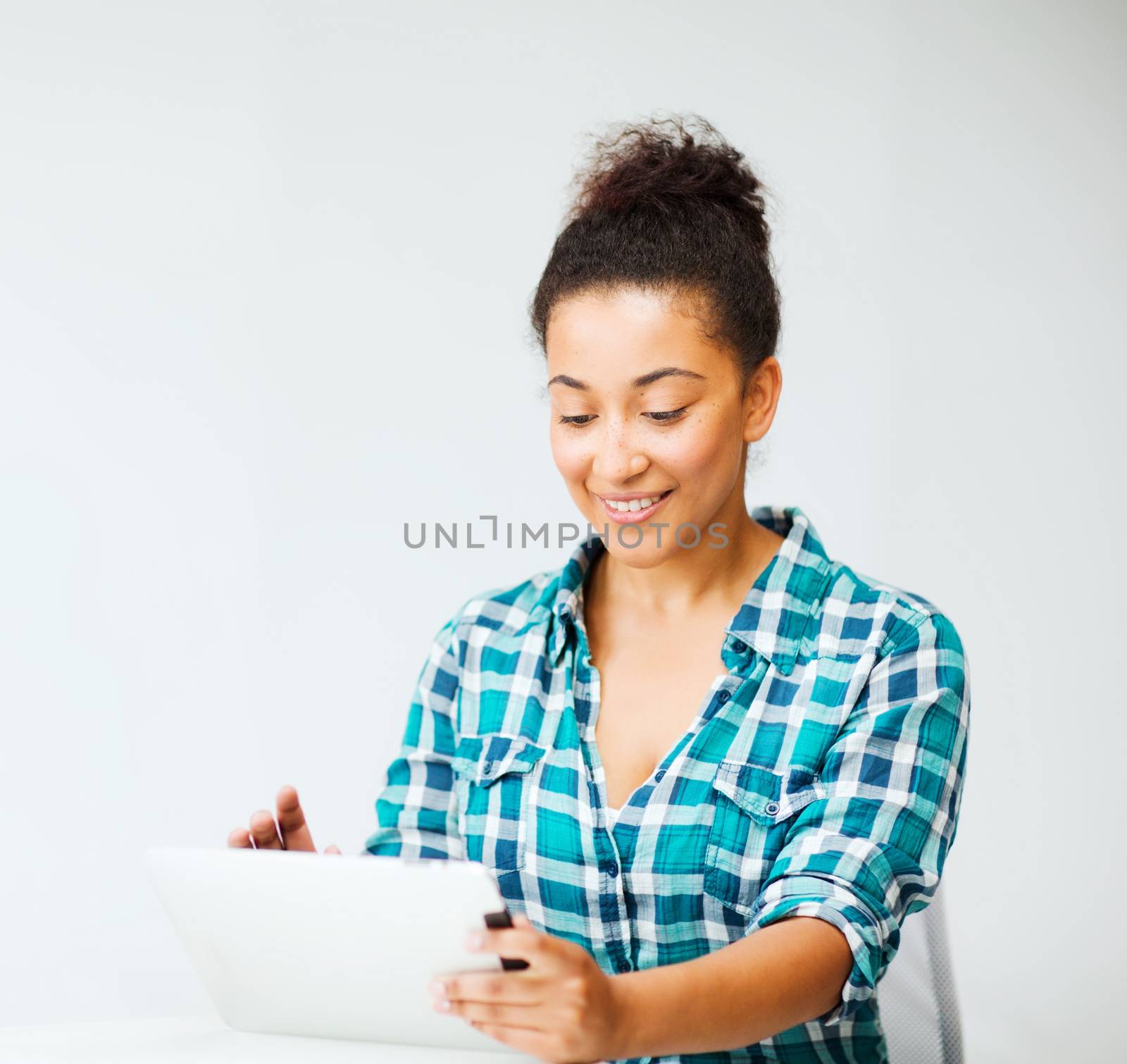 student girl with tablet pc by dolgachov