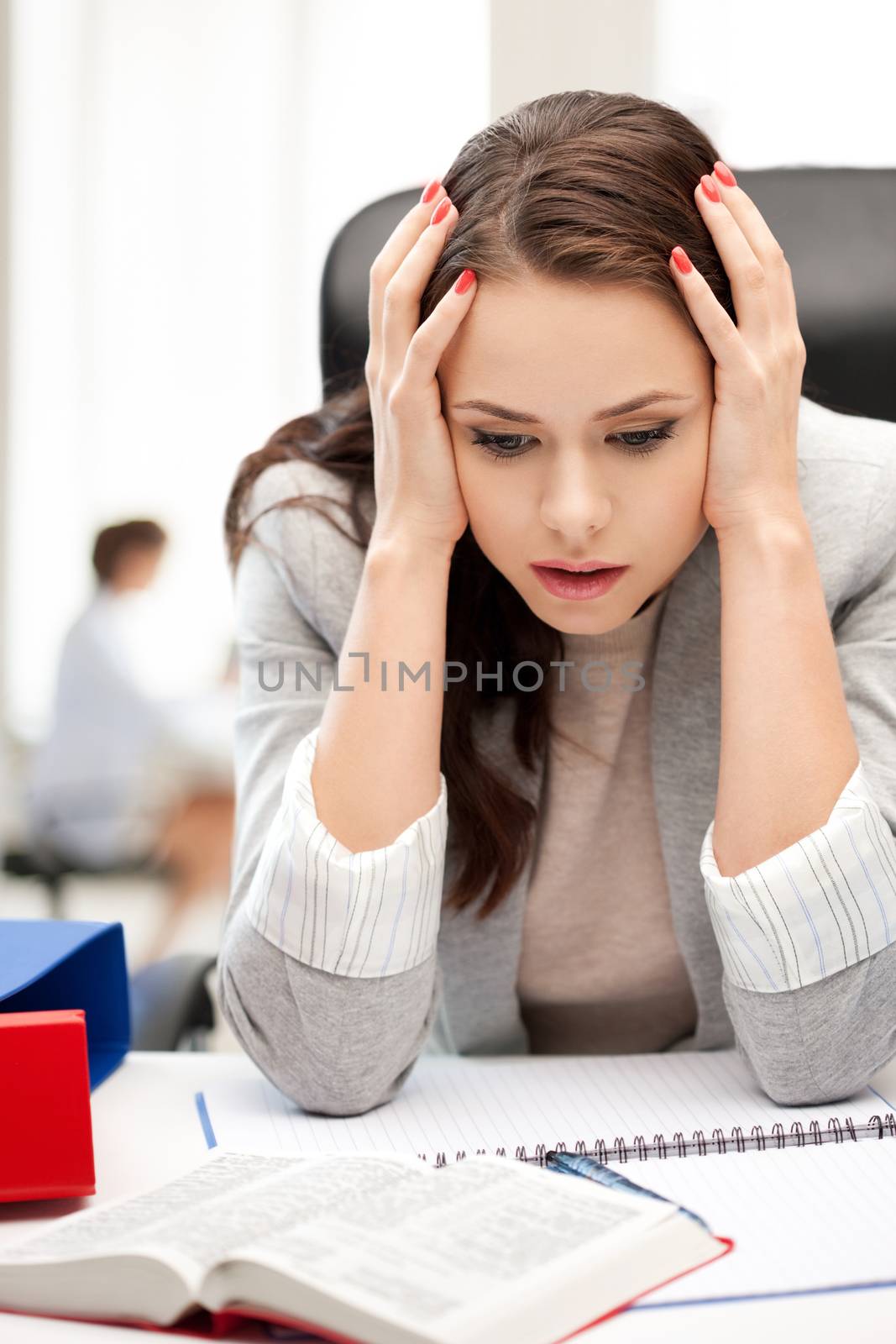 stressed businesswoman in office by dolgachov