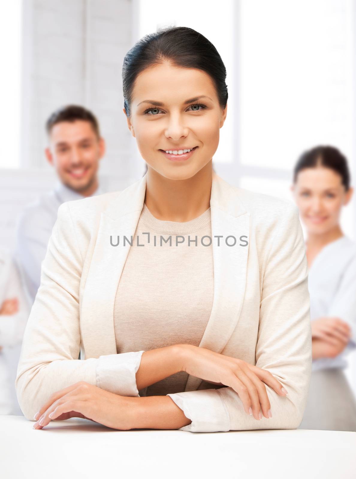 attractive young businesswoman in office by dolgachov