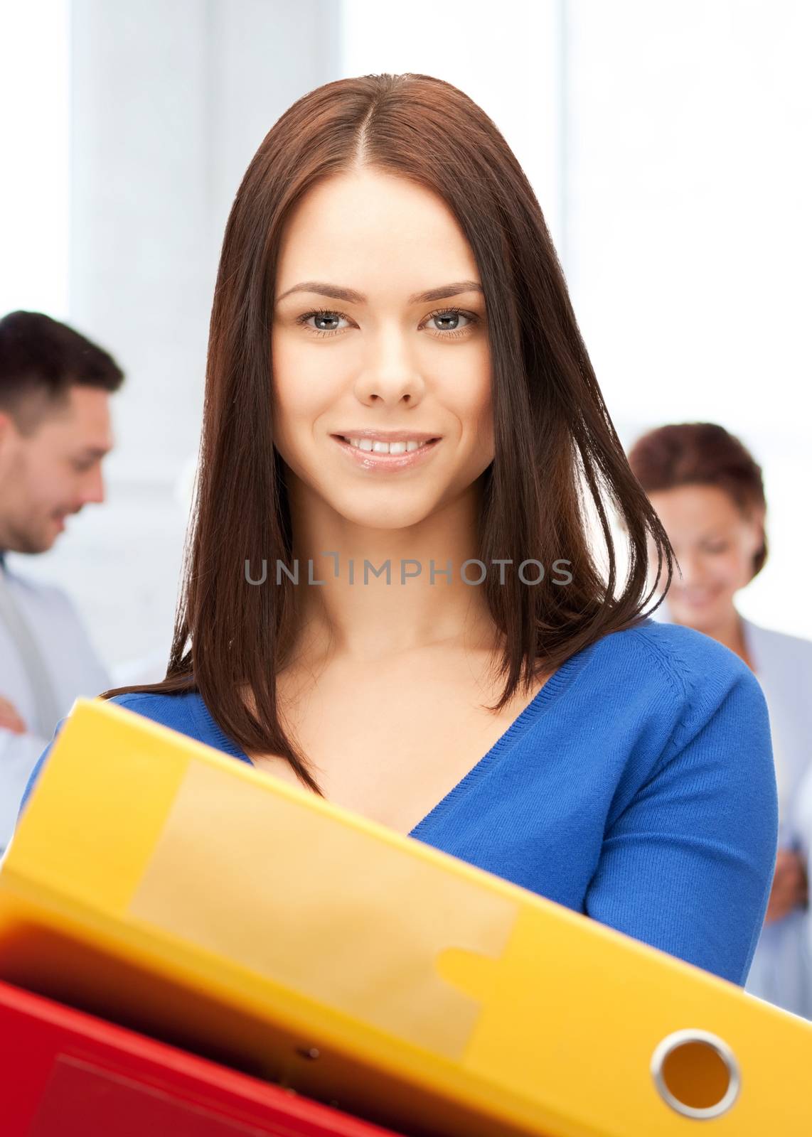 business concept - woman with folders in office