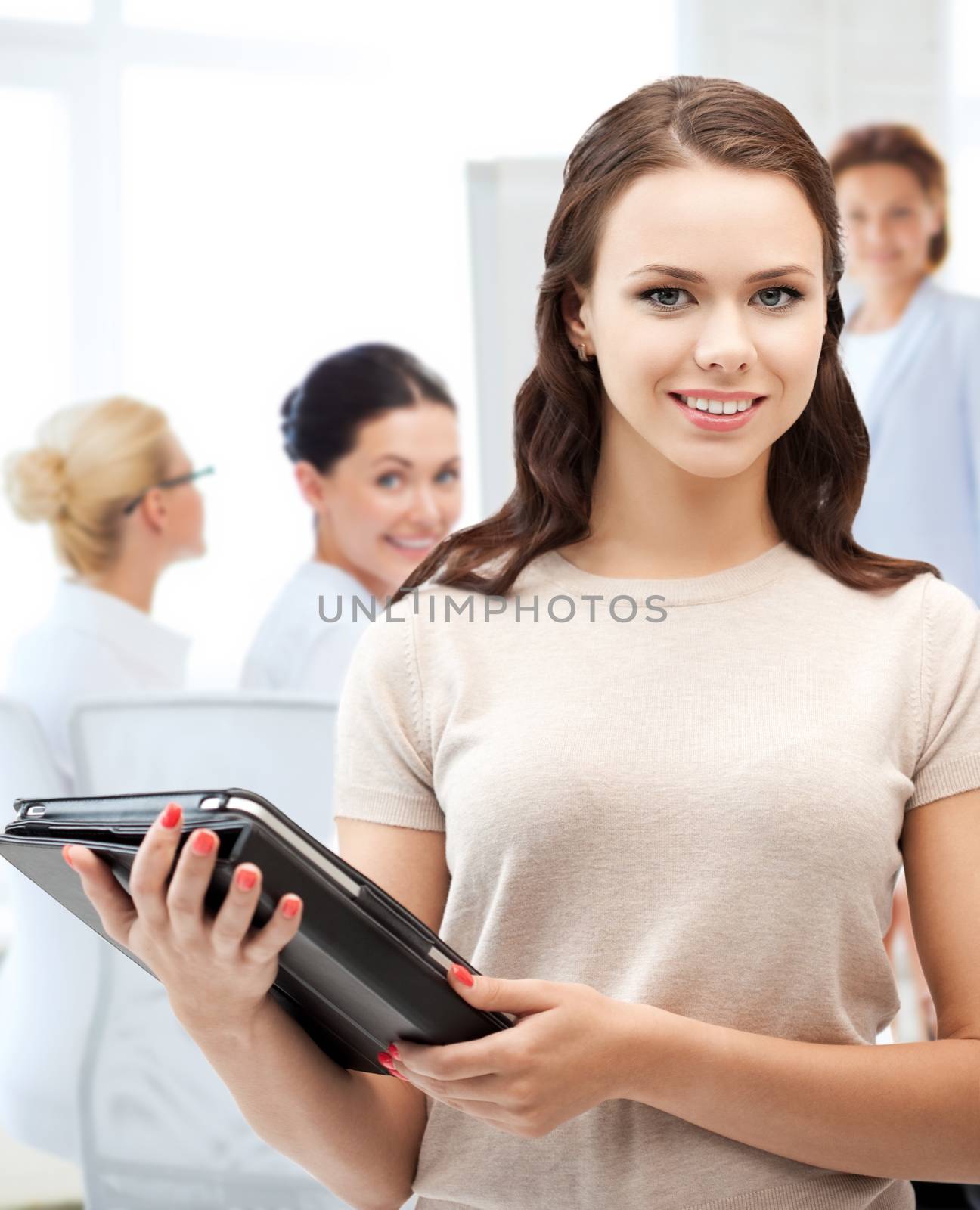 business, internet and technology concept - businesswoman with tablet pc in office