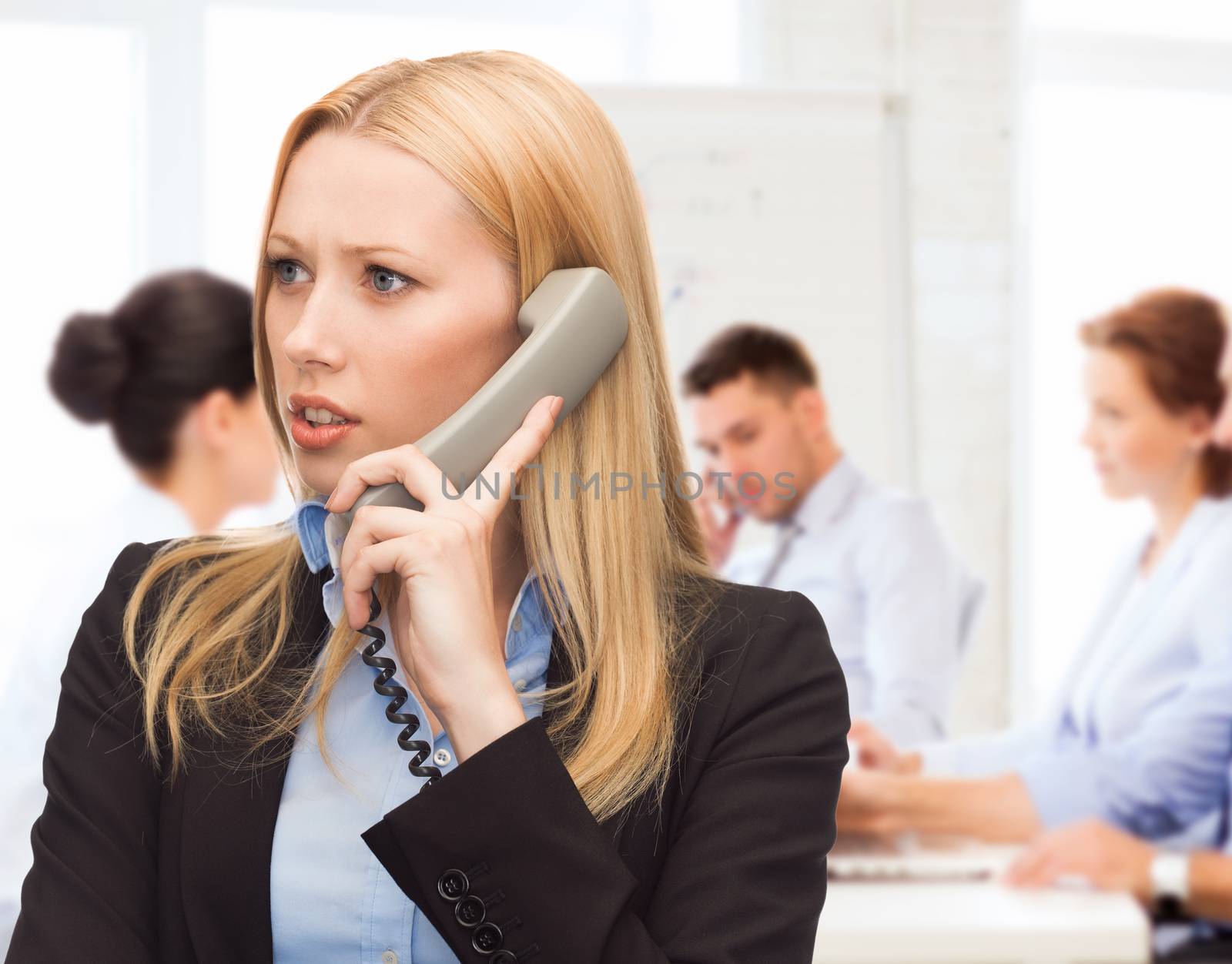 business and problems concept - confused woman arguing on the phone phone