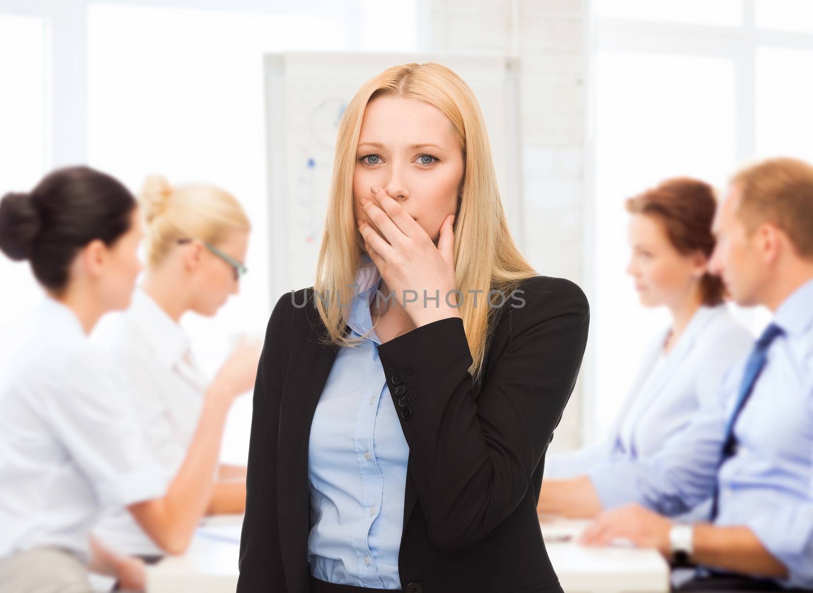 business concept - stressed businesswoman on meeting in office