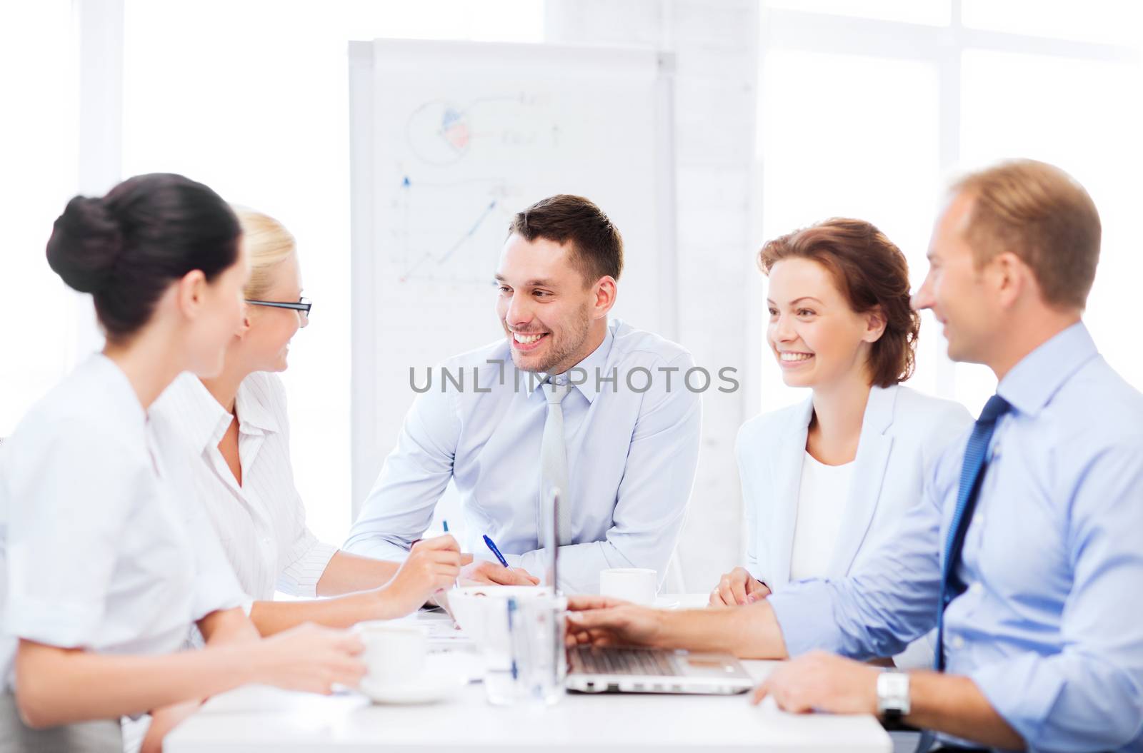 business concept - business team having meeting in office