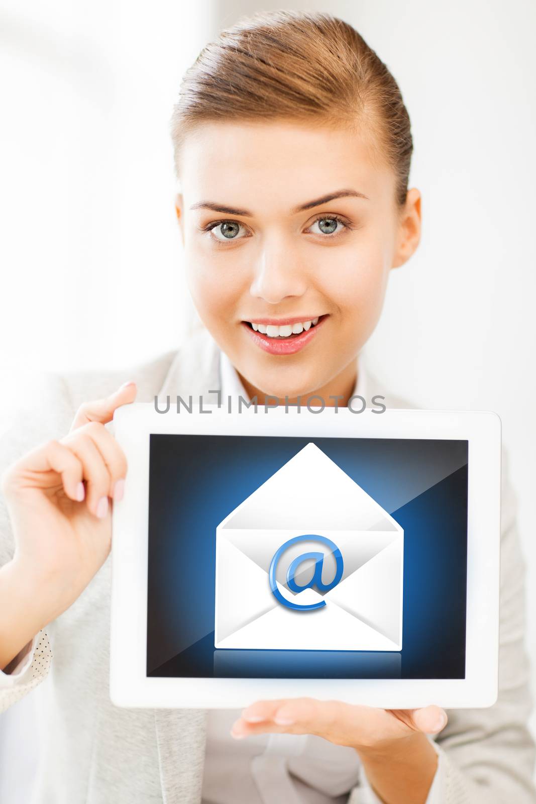 business, communication and internet concept - businesswoman holding tablet pc with email sign