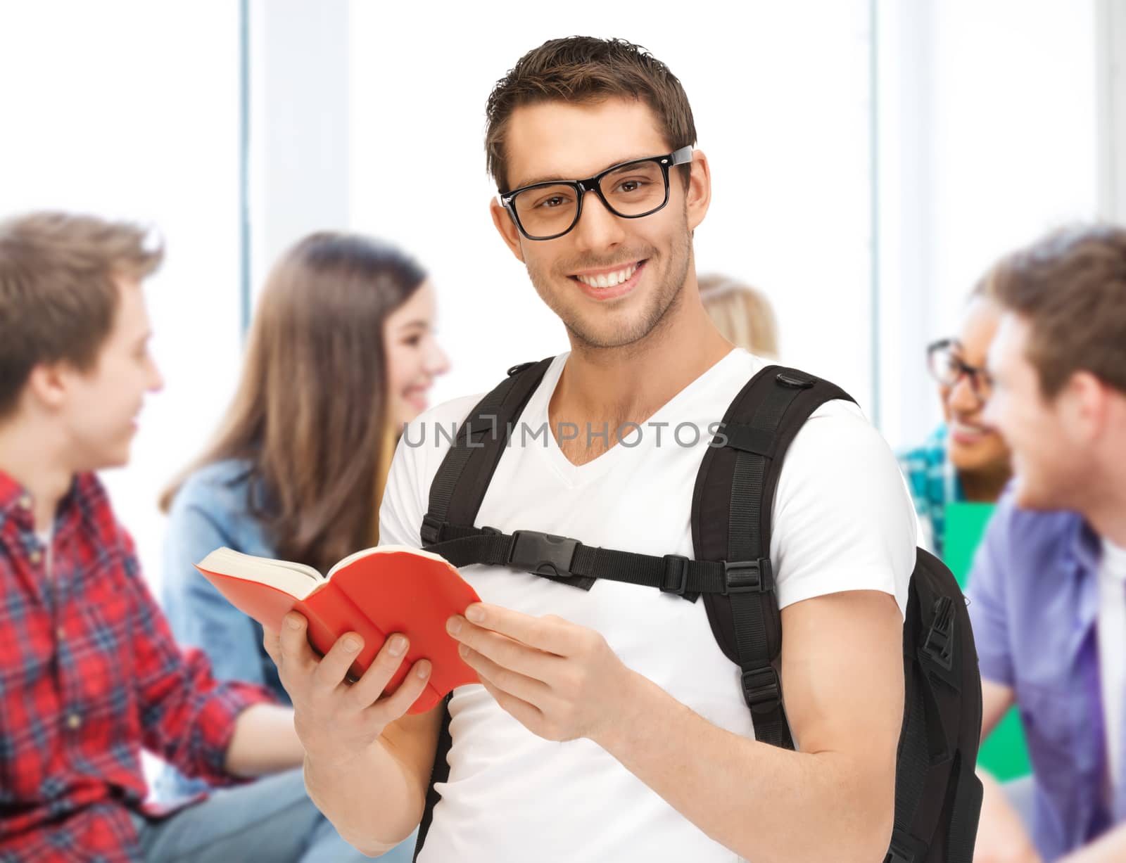 education concept - student boy reading book at school