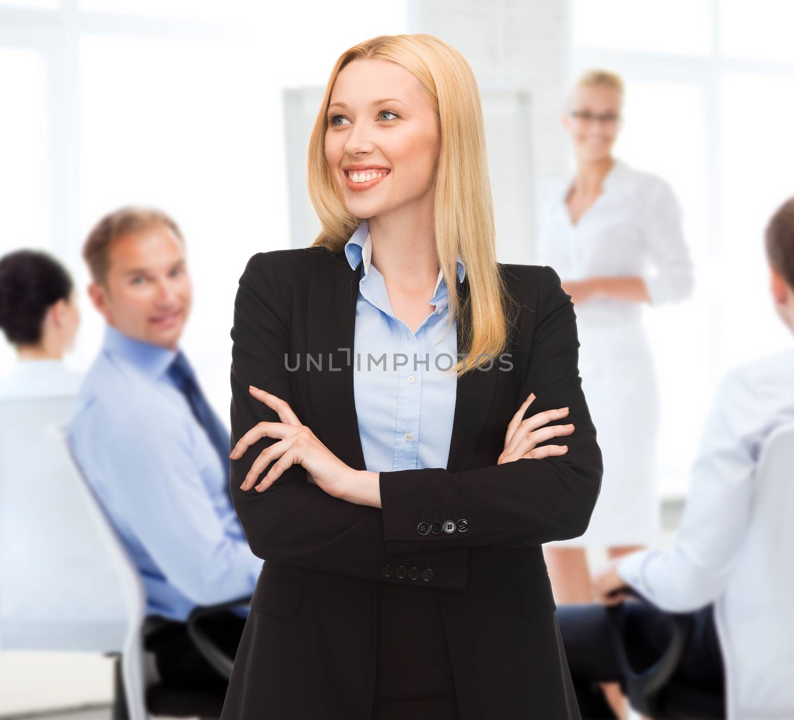 business concept - attractive young businesswoman in office