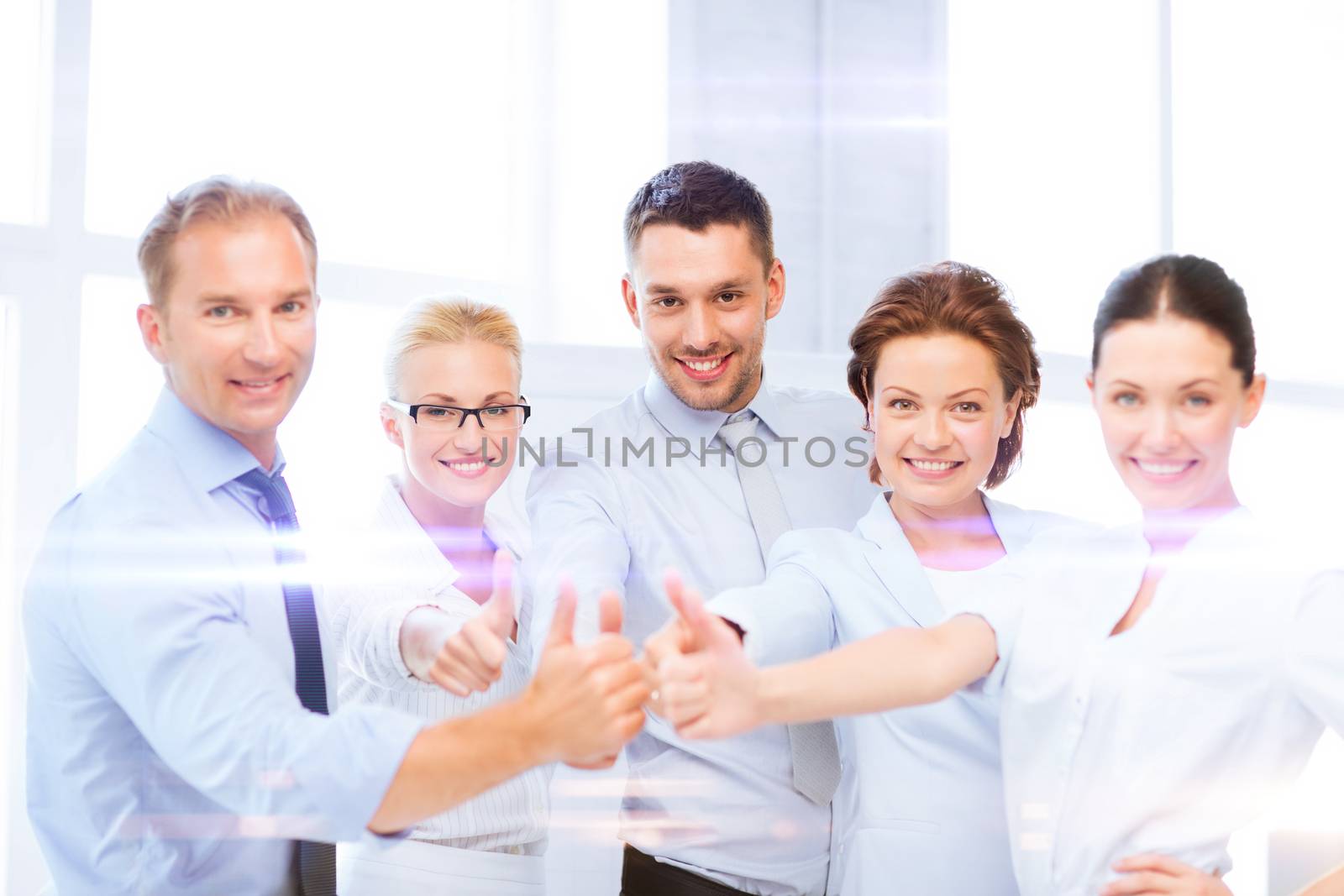 business and office concept - business team showing thumbs up in office