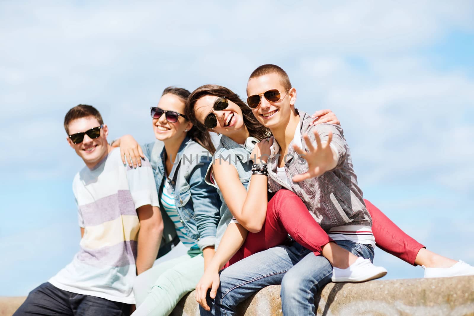 group of teenagers hanging out by dolgachov