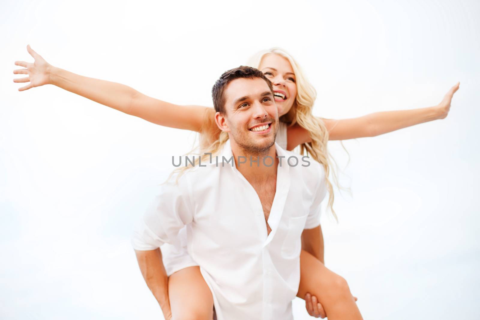 summer holidays, celebration and dating concept - couple at seaside