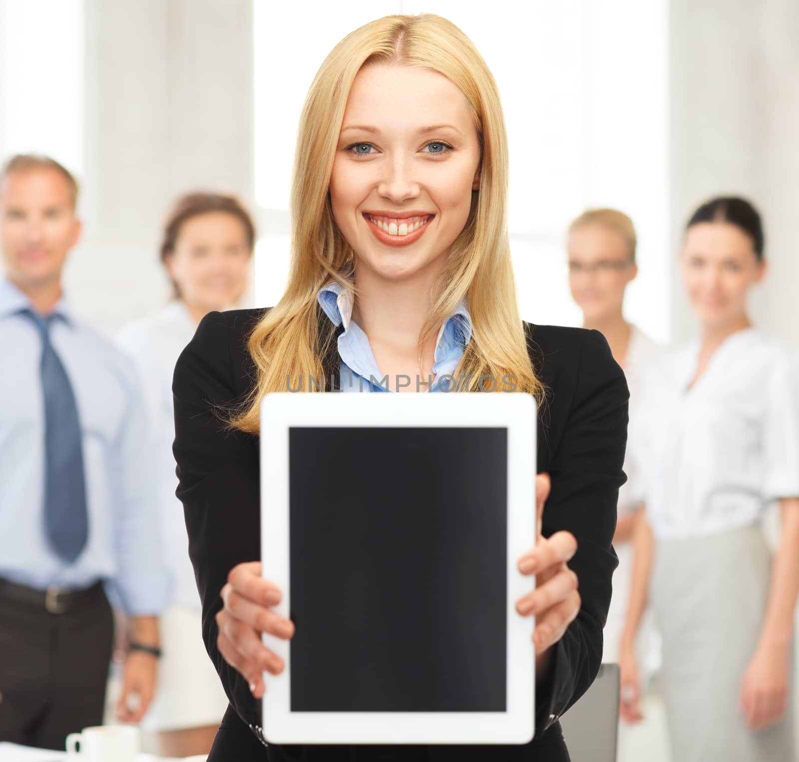 business , education and internet - smiling woman with tablet pc in office