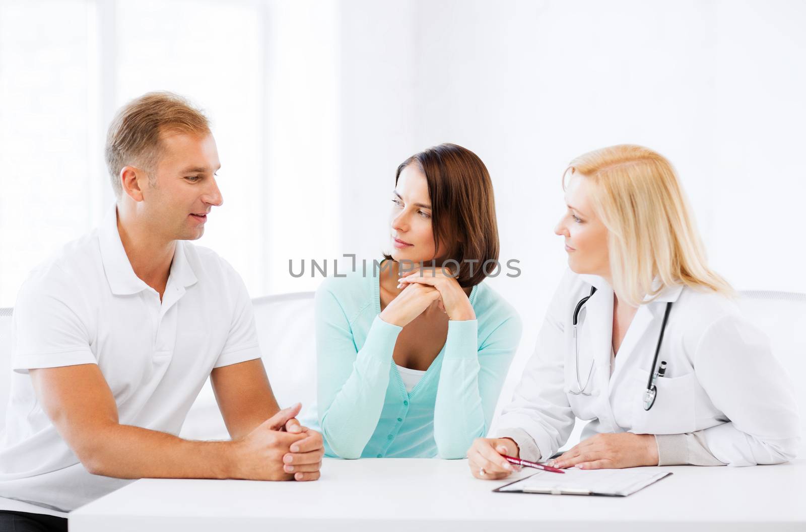 healthcare and medical concept - doctor with patients in cabinet