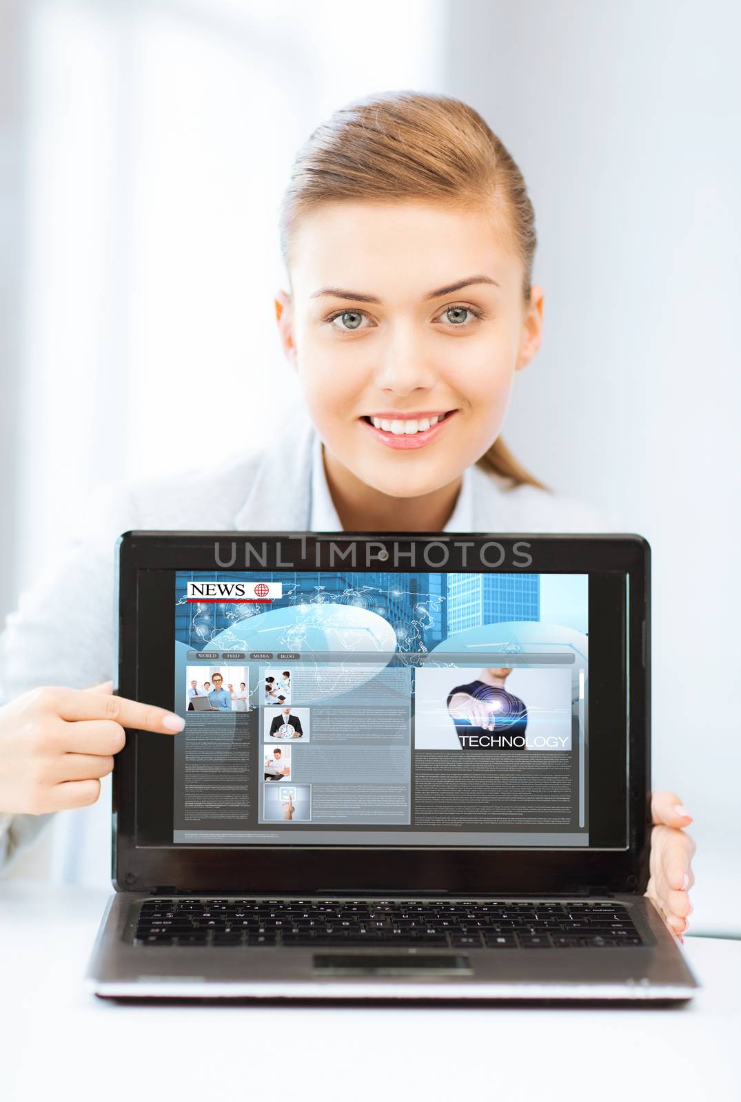 woman showing laptop pc with news by dolgachov