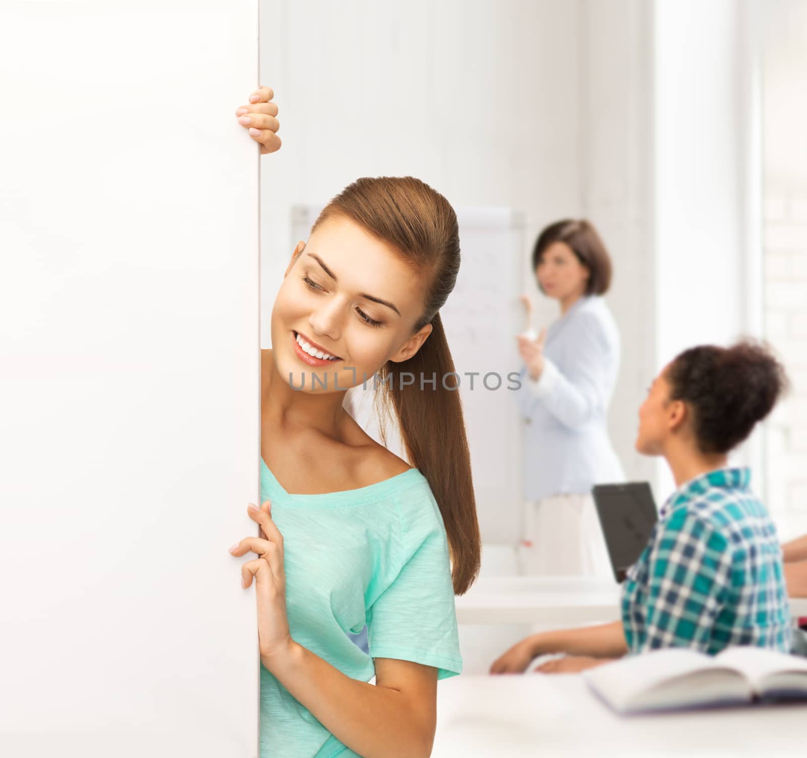 education concept - smiling student girl with white blank board