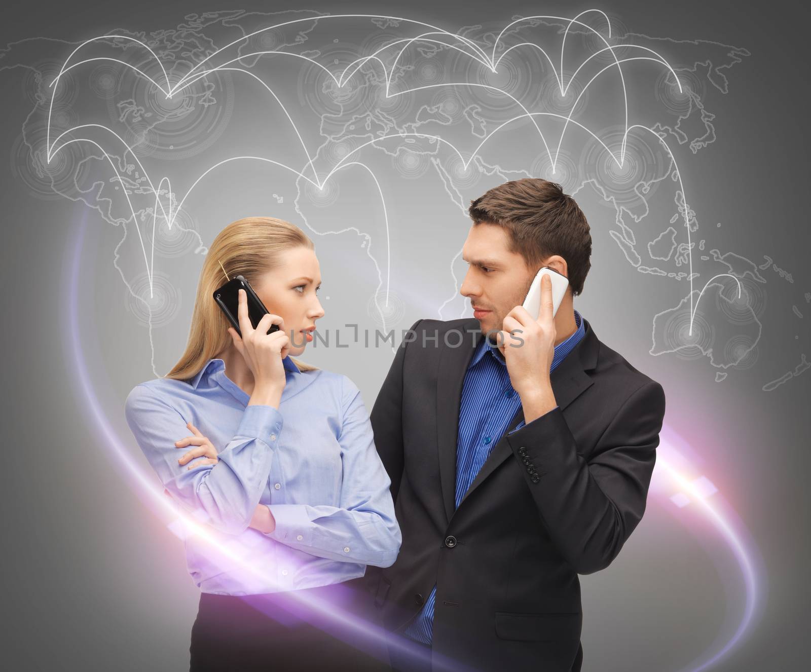 man and woman calling with smartphones by dolgachov