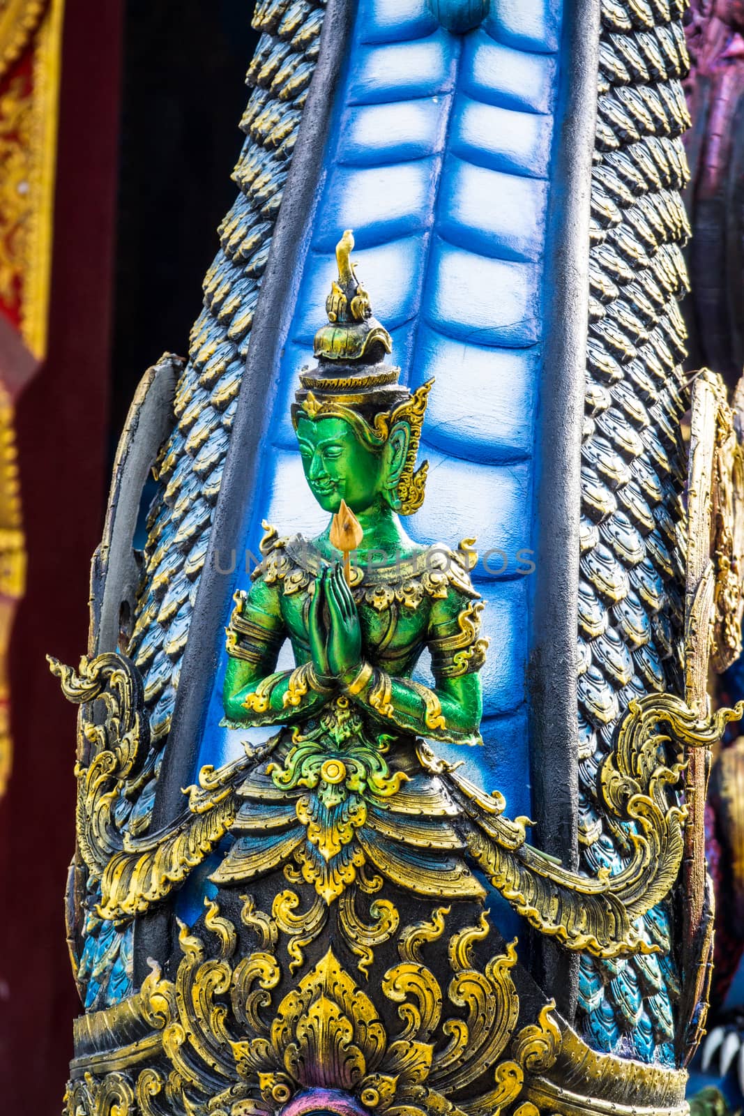 green angel sculpture at Chiangrai temple,Thailand