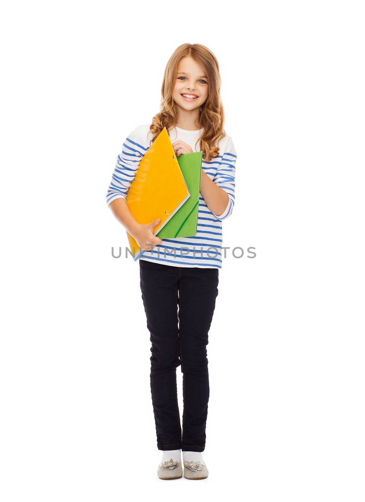 child holding colorful folders by dolgachov