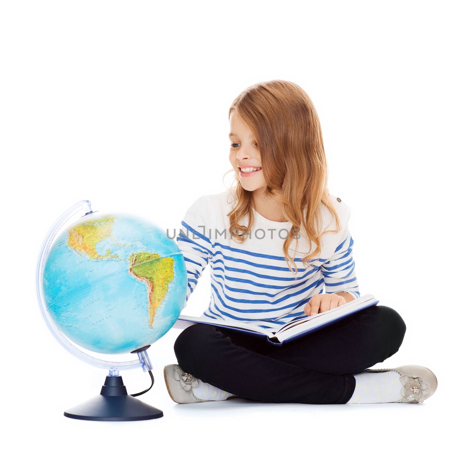 child looking at globe and holding book by dolgachov